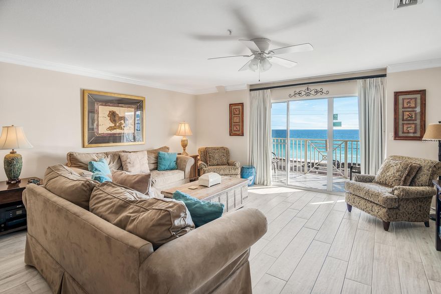 Incredibly rare opportunity to own a 3-bedroom penthouse unit within the highly desirable Amalfi Coast Resort, a gated, low density Gulf view condominium. Unit A402 offers a prime location nearest the beach in Building A with spectacular Gulf views from the top floor. This unit has been beautifully updated with wood look tile flooring throughout, neutral paint and crown molding in the common areas. Gulf views can be enjoyed from all the common areas and the master bedroom. The living area and master feature direct access to an expansive 160 sq. ft. balcony where mesmerizing sunrises and sunsets over the Gulf can be seen. This unit offers a spacious open floor plan boasting 1,805 sq. ft. and comes fully furnished making it a great turnkey investment with projected rental income of $68.7k!