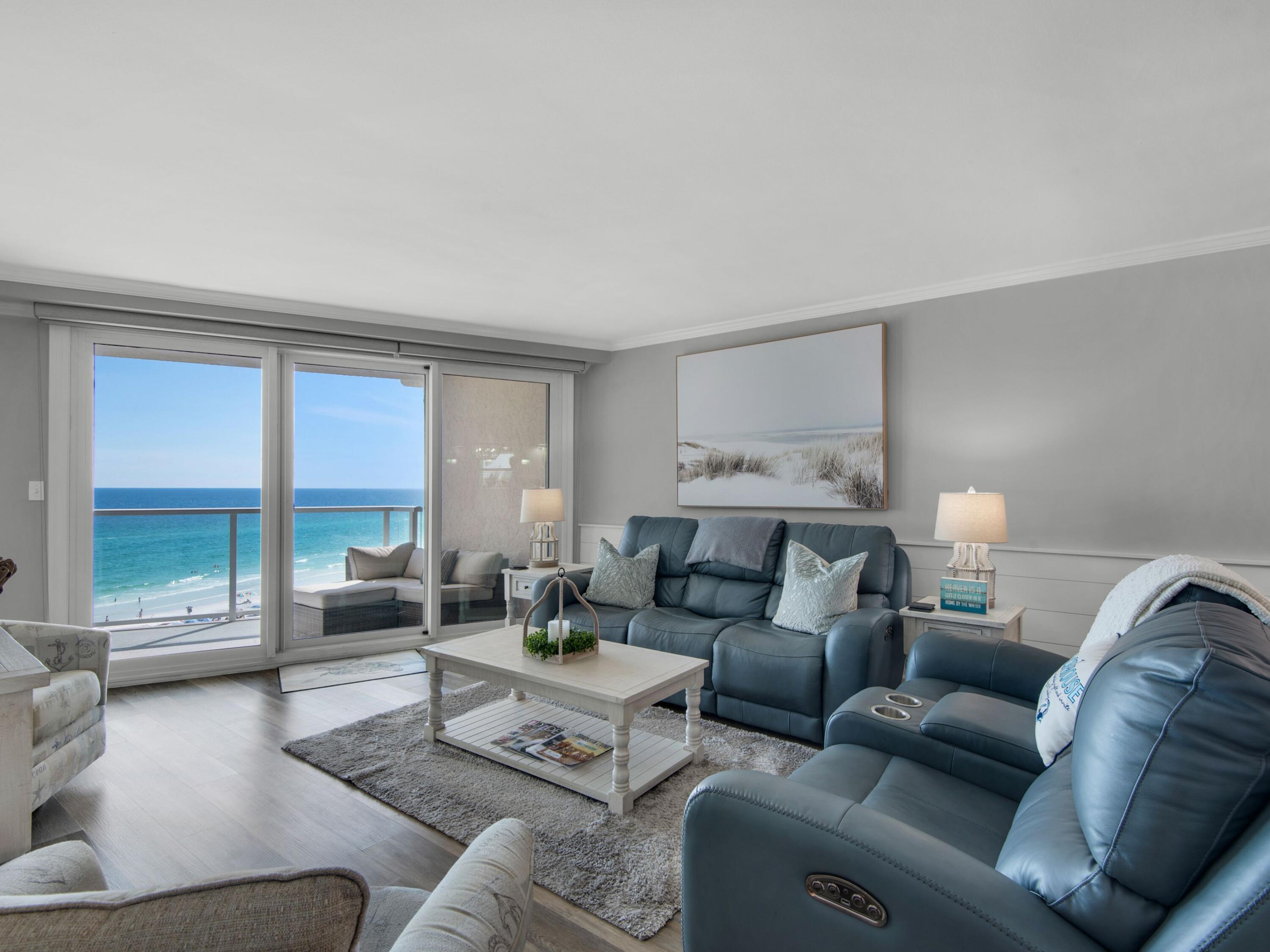 Tastefully furnished and updated throughout, this two-bed, two-bath condo has stunning views of the beach from the open sitting room and master bedroom. Shiplap walls and luxury vinyl plank flooring enhance the light-filled living space, which features sliding glass doors opening onto a deep porch. Whether you're relaxing indoors or outside, this eighth-floor unit has incredible views of the beach, pool and Gulf of Mexico through the frameless glass balustrade. Indulge your culinary creativity in the updated kitchen, which has Shaker-style cabinetry and a full complement of GE stainless steel appliances. Granite counters extend to create a bar for casual dining or enjoying pre-dinner cocktails with friends. Two spacious bedrooms include a master suite with a generously sized walk-in closet. You can even enjoy unimpeded gulf views while lying in bed. The ensuite master bathroom features a fully tiled rainhead shower and a single vanity. The second bathroom has a shower-over-tub combo, which is also fully tiled. The Beachside Two building is just finishing up an extensive and beautiful renovation of the exterior and common areas. Onsite amenities include a beautiful beachfront swimming pool, tennis courts, fitness center, community grills, covered parking and an elevator. The community pool area is expecting a full renovation starting mid-August 2024, and when complete there will be a NEW salt water pool with hot tub, sun deck and paver surround with anticipated completion Summer 2025(see renderings in Listing photos). Owners and guests can look forward to a host of attractions and amenities nearby, including golf courses, shopping, dining and watersports.
