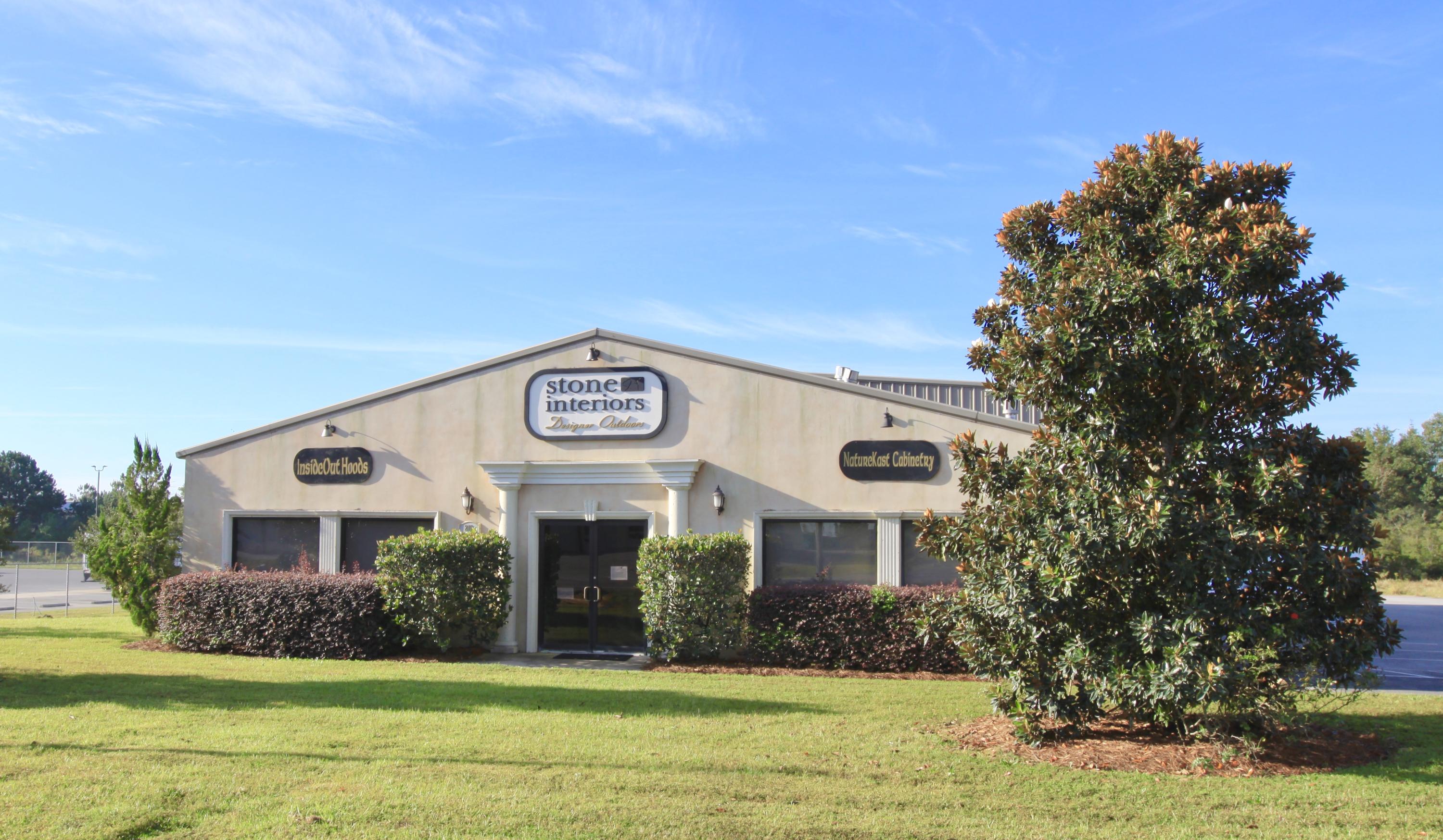 Beautiful Showroom/ Warehouse available in Freeport Fl. This 7400sf property located in the Freeport Industrial Park is conveniently located between Interstate 10 and the beaches of 30A. The building is comprised of 2500sf of showroom, 900sf of office, 3100sf of warehouse and 900sf of mezzanine. The 2 acre yard is perfect for outdoor storage or additional parking. The warehouse portion has two 12x12 over head doors, one 10x 10 overhead door, 18ft eave heights and 24'' dock height. Current Tenant will vacate December of 2018, property also available for lease.