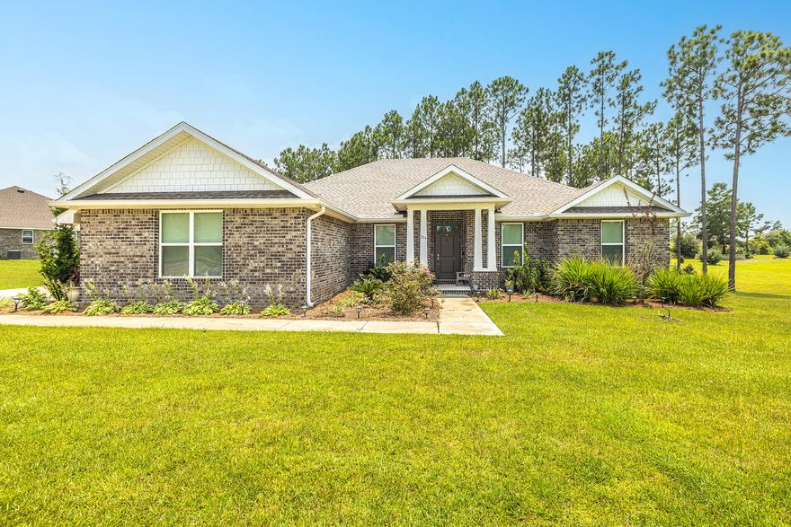 Welcome to ''The Coastal Breeze Estate '' Discover the perfect blend of comfort, community, and coastal living in this beautiful 5 Bedroom, 3 Bathroom home located in the popular Windswept Estates in Freeport, Florida. Built in 2020 this one story custom brick home offers everything you need. Step into a bright and expansive layout with large windows, generous bedrooms and living areas, perfect for gathering and entertaining. The heart of the home features an open-concept floor plan with modern kitchen, multiple seating areas, and a seamless flow into the outdoor living. Outside, enjoy the massive backyard with a custom-built deck that's perfect for summer BBQs, relaxing afternoons, or kids and pets play time. Plenty of room for a Private Pool & Spa, Playground or a cozy... cozy outdoor fireplace for the cool winter evenings. Windswept Estates is known for its spacious homesites, beautiful amenities to include a Community pool & Pool house, Tennis and Basketball courts, spacious Kids Playground and the well maintained 18-hole Golf Course located in the heart of the community (Separate Membership is required). Short drive to top-rated schools, local restaurants, sports complexes, and the beautiful beaches and bay access the Emerald Coast is famous for.
Whether you're commuting to Santa Rosa Beach, Panama City Beach, Niceville, or Eglin AFB, you'll appreciate easy access via Highway 20.
Come experience the relaxing vibe and friendly lifestyle of 235 Coastal Breeze Drive today - where space, location, and community come together.  Upgrades to include - all new ceiling fans, finished attic space with added staircase, the living room has been painted as well. TV's and laundry appliances are excluded. Current Furnishings inside the home are similar but not as shown in the pictures. Buyer, Buyer's Agent to confirm all information.