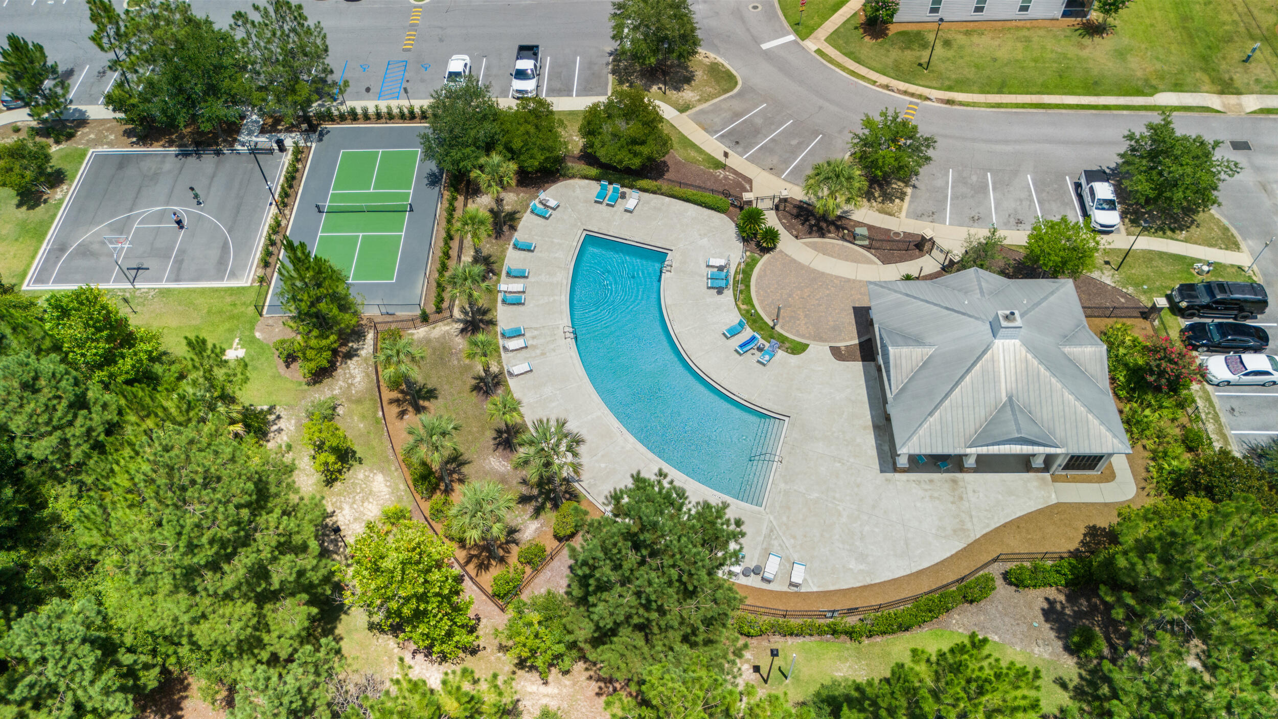 Skip the noise and uncertainty of ongoing construction and settle into the refined comfort awaiting you at 280 Date Palm Lane. Set further back into the community, this luxury townhome offers a peaceful setting while keeping you local to everything Freeport has to offer. Residents enjoy access to the community POOL, playground, basketball, and brand-NEW pickleball courts, creating space for both relaxation and recreation right at home. Inside, the open-concept living area offers a versatile space for gathering or recharging. All bedrooms are located upstairs, allowing for added privacy and a smooth transition from the main living space. This particular unit includes a garage and is positioned next to green space, two features that set it apart. The screened enclosed porch offers a great place to enjoy morning coffee or unwind in the evening while staying shaded and bug-free. Other highlights include double vanities and l-shaped walk-in closet in the primary suite, a pocket door in the downstairs powder room, ceiling fans and lights in each bedroom, architectural trim, faux wood blinds on all windows, and generous storage throughout the home. The washer and dryer are included, and the home is finished with Moen satin nickel fixtures, quartz countertops, LVP floors throughout (no carpet!), and a durable metal roof. Located under half a mile from Freeport Elementary with easy access to both Highway 20 and Highway 331, this property offers everyday convenience in one of Florida's fastest-growing towns. Make sure to ask your agent for a link to the video tour!