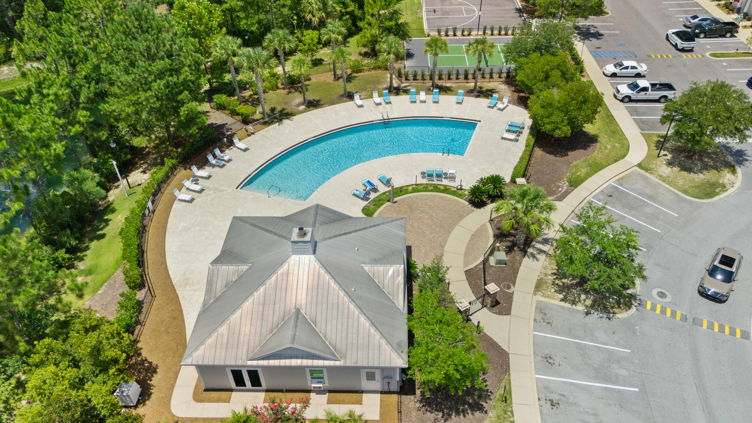 Skip the noise and uncertainty of ongoing construction and settle into the refined comfort awaiting you at 280 Date Palm Lane. Set further back into the community, this luxury townhome offers a peaceful setting while keeping you local to everything Freeport has to offer. Residents enjoy access to the community POOL, playground, basketball, and brand-NEW pickleball courts, creating space for both relaxation and recreation right at home. Inside, the open-concept living area offers a versatile space for gathering or recharging. All bedrooms are located upstairs, allowing for added privacy and a smooth transition from the main living space. This particular unit includes a garage and is positioned next to green space, two features that set it apart. The screened enclosed porch offers a great place to enjoy morning coffee or unwind in the evening while staying shaded and bug-free. Other highlights include double vanities and l-shaped walk-in closet in the primary suite, a pocket door in the downstairs powder room, ceiling fans and lights in each bedroom, architectural trim, faux wood blinds on all windows, and generous storage throughout the home. The washer and dryer are included, and the home is finished with Moen satin nickel fixtures, quartz countertops, LVP floors throughout (no carpet!), and a durable metal roof. Located under half a mile from Freeport Elementary with easy access to both Highway 20 and Highway 331, this property offers everyday convenience in one of Florida's fastest-growing towns. Make sure to ask your agent for a link to the video tour!