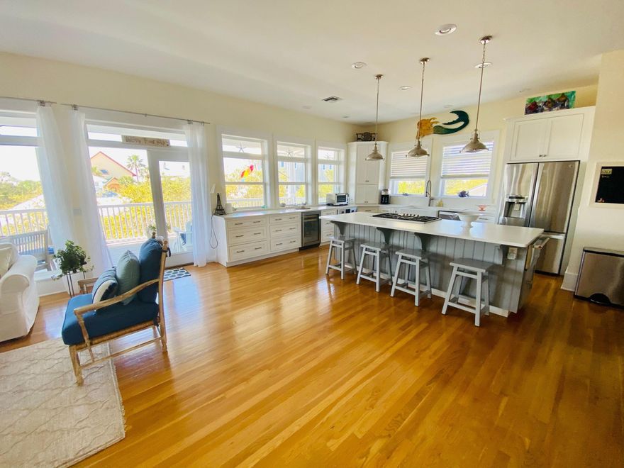 Fantastic Florida cottage in the coveted, gated community of Old Florida Beach, centrally located on an over-sized lot backing up to neighborhood pool with great view of the gulf. Just steps to the beach walkovers, the community pool and the Draper Lake dock. The first floor has 4 bedrooms, including the master suite. The second floor has an open, updated kitchen flowing to family room and outdoor porch. The third floor tower offers additional sleeping and family room area with full bath and amazing views of the Gulf of Mexico. Great rental property or primary home. Old Florida Beach community is located south of 30A directly on a private beach, has heated community pool, lake dock, and 3 private beach access.