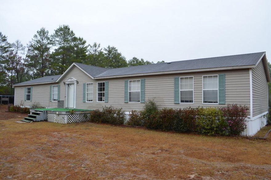 This is an REO Property. This home was built in 2003, this 4 bedroom 2 bath double wide mobile home has living room, family room with fireplace, open kitchen and split bedroom design. Property sits on over 3 acres and is just a few miles for both city of Defuniak and Hwy 285. This home needs some minor repairs, however may not qualify for all financing. A fantastic opportunity for both home owner and investor alike! Call today for your showing!
