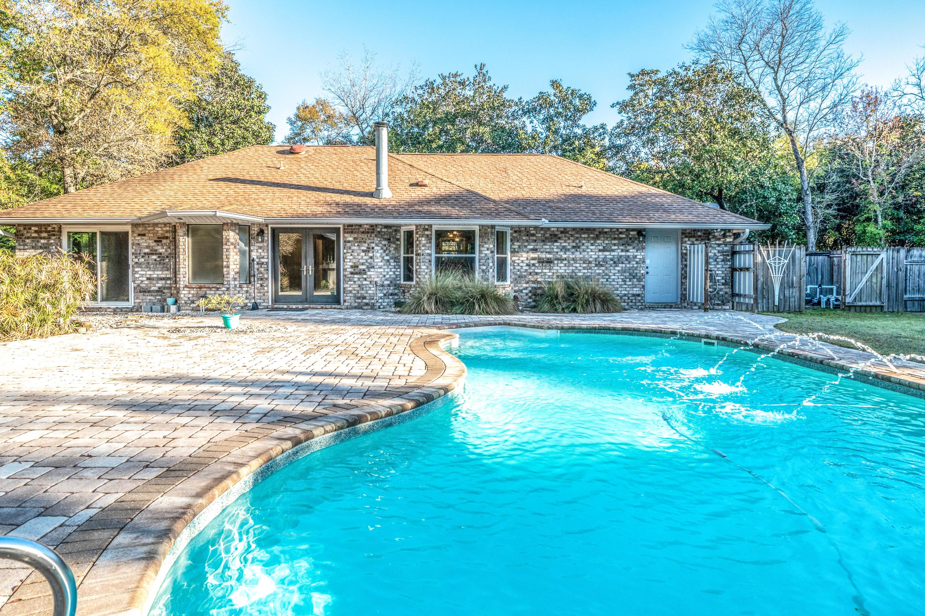 A remarkable cul-de-sac POOL home in Robledal. Bike riding, dog walking and jogging is very common in this neighborhood. Windy roads and full of oak trees is some of the beauty of this Bay front community.This home also features a 800 sf MOTHER-IN-LAW PRIVATE SUITE with a oversized 396 SF work shop and two car garage. Full kitchen, living room, washer/dryer conveys and a spacious 1 bedroom/ 1 bath for that special someone in the family that needs space of their own.The pool is surrounded by blooming trees and flowers, fully fenced property, pavers up to the front door and surrounding the pool also. New flooring, paint, some new windows, stainless steel appliances, and 2nd set of washer/dryer convey.