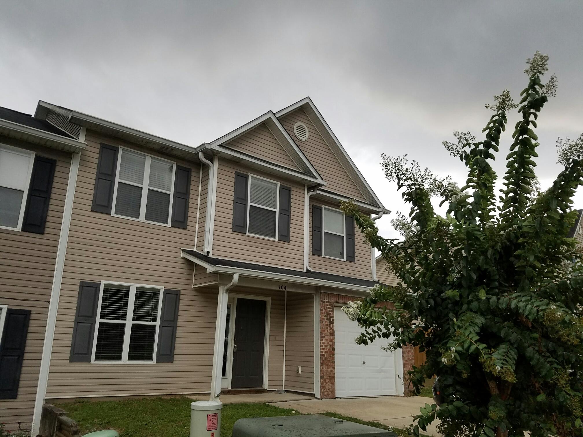 Incredibly spacious and unfurnished townhome for rent in Crestview, Florida! This 5BR/3BA home at Stillwell Estates offers a variety of sought-after features. The master bedroom comes outfitted with a large walk-in closet and sitting area while the accompanying bath finds itself done up with a beautiful garden tub that is perfect for relaxing in after a long day's work. One of the five bedrooms is located on the first floor which would be great as an office or game room. Outside there is a patio that overlooks a nice green space. Do not worry about maintenance though as lawn care is covered by the HOA. This rental also comes with a large garage and installed washer/dryer.