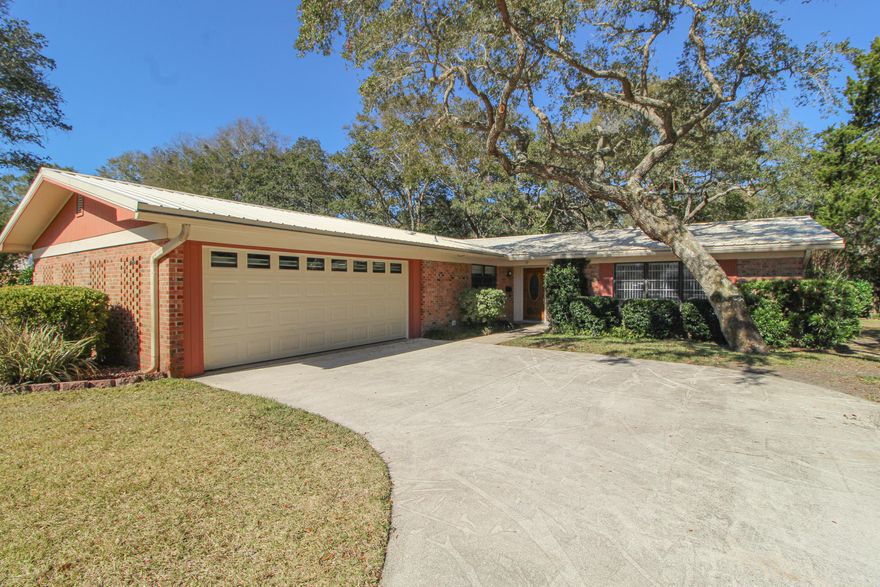 Explore the possibilities at this 4 bedroom brick home in the much-desired Kenwood area.  Property sits on a quiet road with no thru traffic. As you enter, you will appreciate the spacious living area, natural lighting, and two dining spaces. Separate sleeping quarters are down the hall for added privacy. Master bedroom is carpeted and has an upgraded full bathroom. 3 guest bedrooms and an upgraded guest bath are across the hall. Door in one of the guest bedrooms leads out to the large storage / laundry room and garage. Exterior features include fresh landscaping, nice size fenced backyard with open patio, two-car garage with access to storage / laundry room, large driveway, and metal roof. See more --->