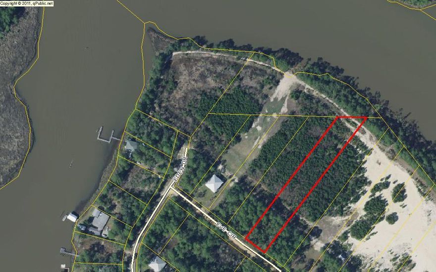 Lot 5 Eve Circle is a little over a half acre lot in Pt. Washington that includes an easement on the canal leading to the Intercoastal Waterway. All information is deemed accurate but should be verified by the buyer. Listing agent is related to the seller.