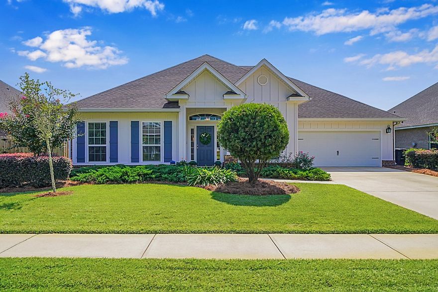 Welcome to 428 Lilly Bell Lane! This beautifully well manicured and well maintained, craftsman style home offers 5 bedrooms,3 baths, a formal dining room and a beautiful office with built in cabinets as well as a two car garage. This home is one of the few McKenzie floor plans offered in Hammock Bay, is perfectly situated in Central Park.  Upon entering this lovely home, you're greeted by a large welcoming foyer, off to the left is an office and to the right is the dining room.  There is porcelain tile wood look plank flooring in all common areas of the home and natural lighting that fills the open concept-space.