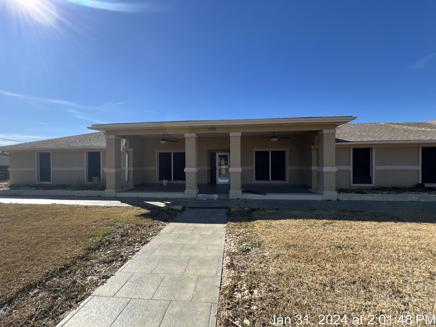 Welcome home to this large, unique, REO property. Originally built in 1986, this split bedroom designed, 4 bedroom 3 bath home has seen several modifications over the years. Lots of tile can be found in the full baths with tiled floors, walls, and ceilings. Ornate tile can also be found at the entrance and covering the front porch. Home has stucco exterior, workshop, screened lanai area, and the back yard is completely fenced in with cinder block walls. Lots of hardwood floors, recessed lights, and tons of storage. A definite must see to appreciate. Home does need some repairs and therefore will not qualify for most financing. Call today for your showing!