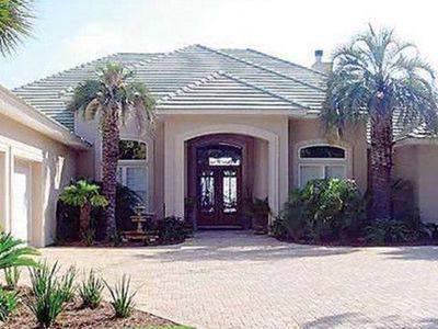 SUPERIOR CONSTRUCTION, HIGHEST ELEVATION, BAYFRONT HOME WITH STUNNING VIEWS. This unique and rare property features: Insulated Concrete Form (ICF) construction, sprayed foamed ceilings, 3/4 inch rubber roof membrane, 1 inch plumbing, 2 80-gallon hot water heaters, 2 A/C & heating systems with Geothermal, GE Monogram appliances, hurricane glass doors, whole house generator, zero- entry, salt water, heated pool with lights & fountains, flood Zone X, and a 2 story dock with 2 boat lifts- all in a quiet, safe neighborhood.