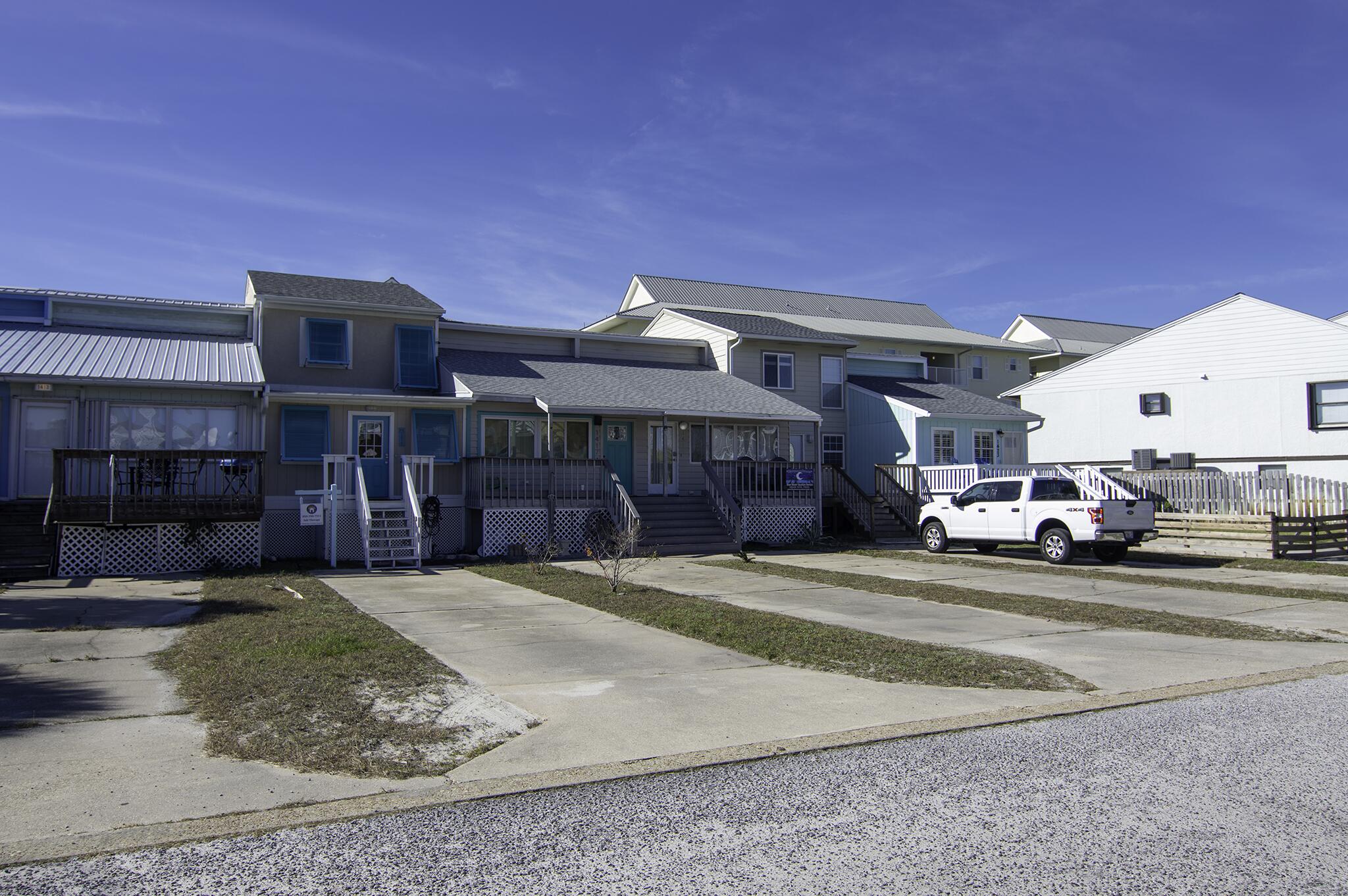 WHISPERING SANDS TOWNHOUSES - Residential