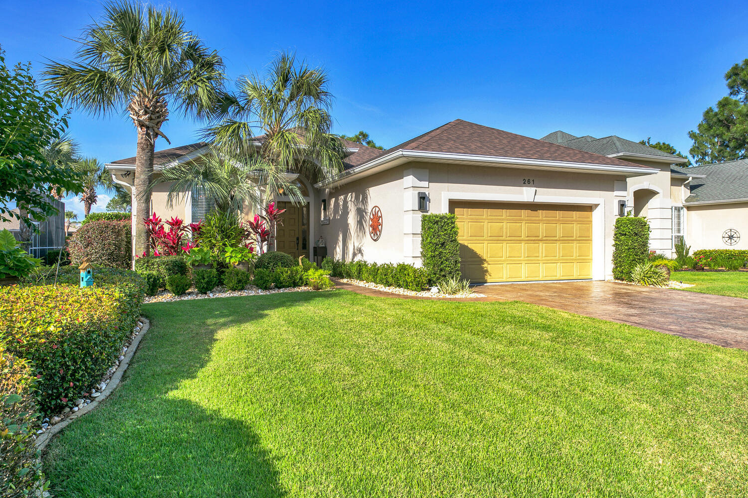 CUSTOM, LAKEFRONT, IMMACULATELY DESIGNED & MAINTAINED HOME W/NEW ROOF IN GATED S/D. Large columns, 12 & 10 ft ceilings & mostly new large, angled travertine flooring take center stage. Bright & luxurious, this highly stylized one-of-a-kind Home w/unique floor plan has been designed for comfort & to capture gorgeous lake views. 3 dining areas offer flexibility while the large living area embraces fireside comfort. Unique in color, new granite counters & backsplash provide a regal backdrop for the custom bar area & SS appliances. Offering a split floor plan, the luxurious master wing, w/calming lake views, adjoins the huge master bath w/stunning new shower, jetted tub & his/her vanities. The other 2 BRs, each w/gorgeous new bathrooms, sit in separate wings.Elegant finishes compliment