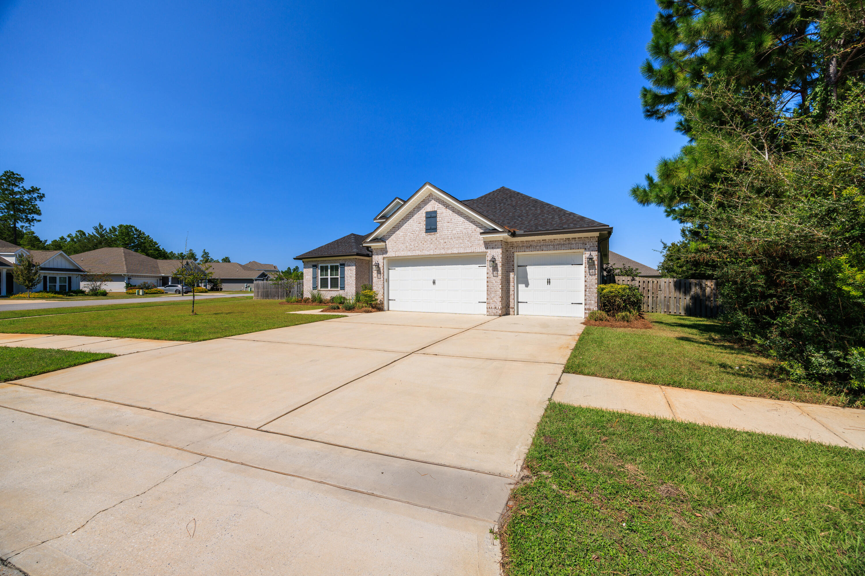 Randy Wise Home! Receive $15,000 in Flex Money with a full-price offer. Use it toward closing costs, interest rate buy-down, or premium upgrades! This former model home by Randy Wise Homes, one of Northwest Florida's most trusted builder, offers over 2,550 sq ft of expertly crafted space on a prime corner lot in Ashton Park. With 4 bedrooms, 2.5 baths, and a rare size 3-car garage, it's loaded with premium upgrades and built for long-term efficiency.Constructed to Florida Green Building standards and EarthCents certified, the home features advanced insulation, high-efficiency HVAC, Low-E windows, and a tightly sealed building envelope, designed to significantly reduce energy bills. EarthCents-certified homes undergo performance testing to verify energy efficiency across key systems. Randy Wise Homes has earned both an Aurora Award and a Grand Aurora Award for building one of the most energy-efficient homes on the Emerald Coast. This property is also backed by a 10-year structural warranty, offering peace of mind and lasting protection.
The open layout includes a spacious living room and a gourmet kitchen with stainless steel appliances, soft-close cabinetry, and a granite island.
Additional touches include crown molding, under-cabinet lighting, and smart home wiring. A spacious flex room with tampered glass French doors adds versatility, while the master suite features a tray ceiling, soaking tub, separate shower, large walk-in closet, and dual vanities. The mudroom with built-in cubbies adds everyday convenience, and the fully fenced backyard offers space to create your own outdoor retreat.
The brick exterior, front and rear covered porches, and automatic sprinkler system enhance curb appeal and convenience.
Located in a minimal risk X flood zone , this home sits in the thriving town of Freeport, offering the perfect blend of privacy and accessibility. You'll enjoy close proximity to Publix and top-rated schools, and a convenient access to the white sands of 30A, South Walton's dining and shopping, Destin's entertainment, Panama City Beach, Eglin and Hurlburt Air Force Bases, and major airports.
A standout example of quality construction, energy efficiency, and thoughtful design! Schedule your showing today!
This home is ready for its new lucky owner!