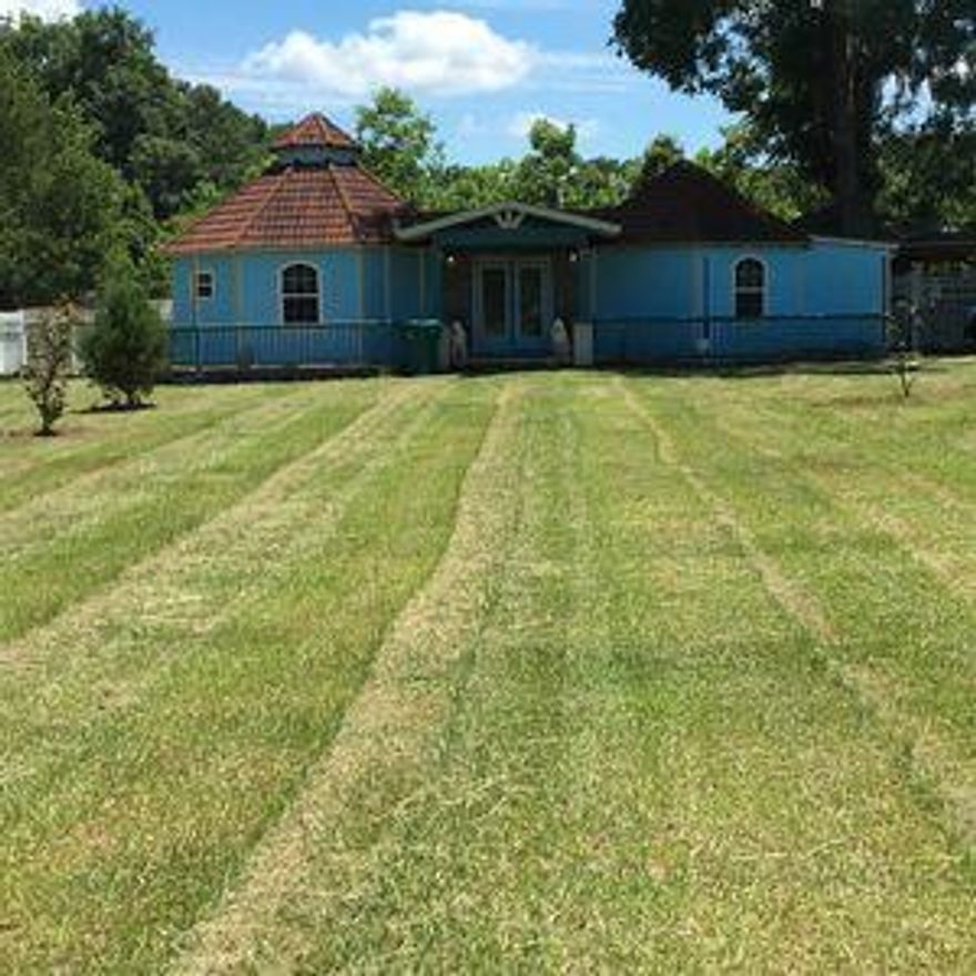 LOCATION, LOCATION, LOCATION! This home is located less than -1/2 a mile from the Jackson County Blue Springs Recreational Area, 5 miles east of Marianna (''The City of Southern Charm''), which is nestled along I-10 just under the Florida-Alabama border and a brief drive west of Tallahassee. This beautiful uniquely designed home is perfect as an investment, second home or primary residence with plenty of room to ''grow'' on a 2.5 acre gated and fenced lot. The home offers views of Florida's natural landscape. The home has cathedral ceilings in the main living spaces, tongue & grove paneled interior, tiled flooring throughout, an enclosed porch overlooking the property. Great rental history  call for additional details and information.