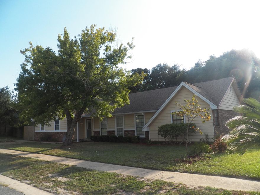 This Destin home has great potential for its new owner. Spacious kitchen with plenty of cabinets, counterspace, breakfast bar, open dining area and tile floors. Family room has laminate flooring and stone wood burning fireplace with bookshelves. This home has two masters one which is the garage converted and is very large. Large fenced back yard with sprinkler system and lawn pump with plenty of room for a pool. There is an additional room upstairs that is unfinished that would work as an office,extra bedroom, or storage. Property conveys in as is condition.