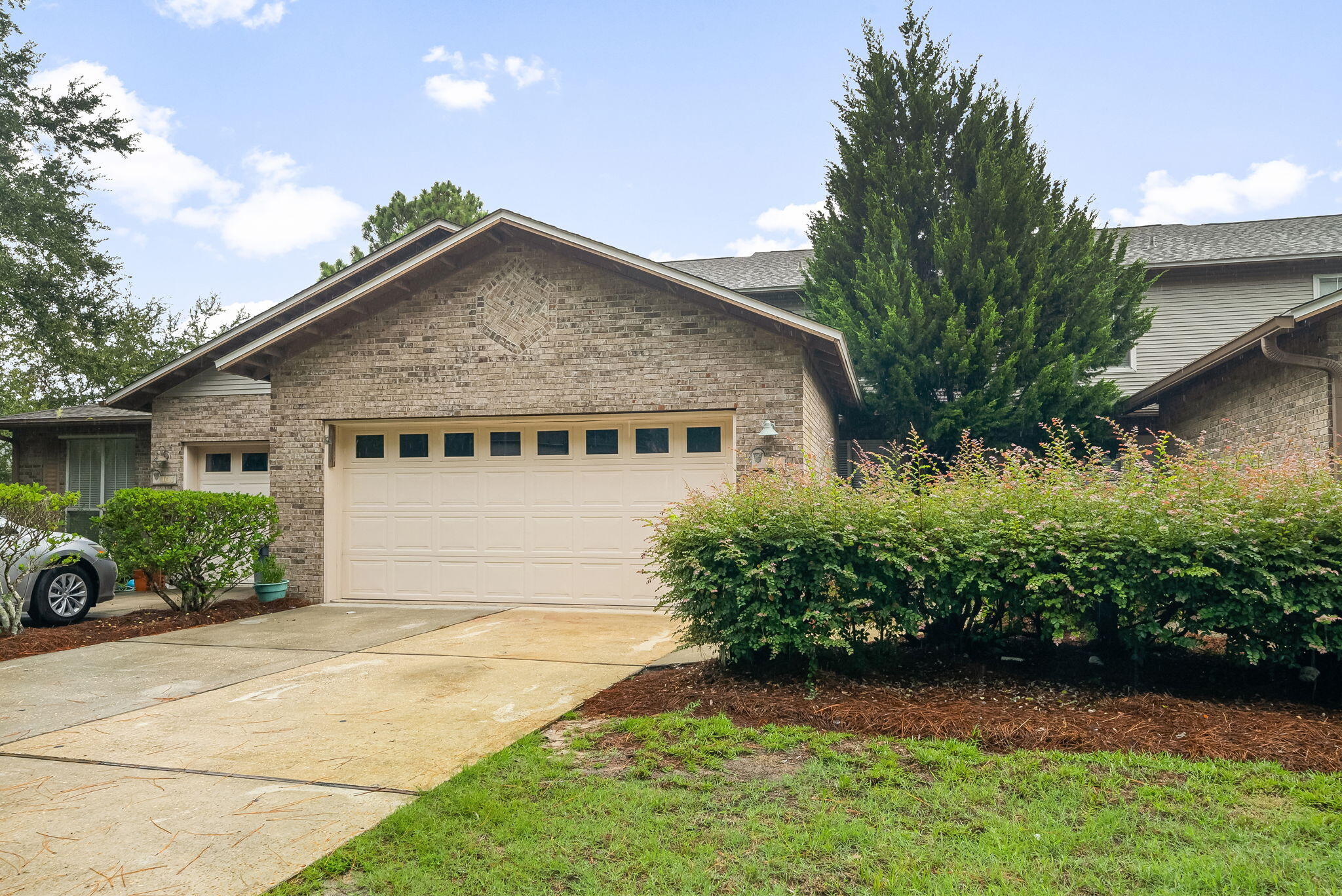 Welcome to the neighborhood of Escada! Escada is found just South of US 98 and just a short ride to the beach! Located near Gulf Place and the west end of 30A in Santa Rosa Beach, this centrally located townhome has easy access to the beaches, dining, and shopping. Enjoy the calming pond fountain just outside of the screened porch as you sip morning coffee. Tall, cathedral ceilings and a cozy fireplace are in the family room. The downstairs master bedroom features a large walk-in closet and ensuite bathroom. This spacious townhome is conveniently located directly across from the pool, clubhouse, and playground. All lawn care/landscaping included and home is move in ready.