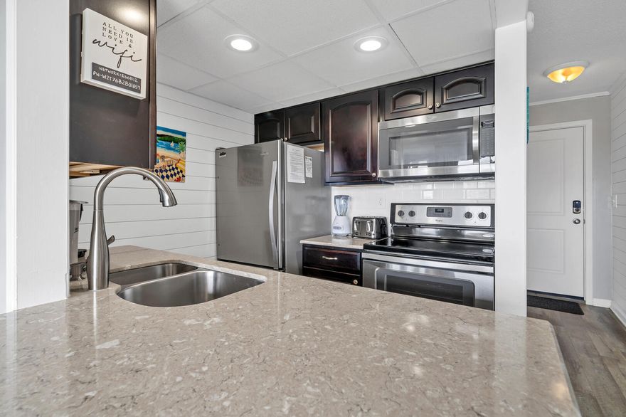 Discover the perfect one-bedroom condo in the heart of Destin, FL! Welcome to Sandpiper Cove, Unit 2005 - an updated gem that boasts an array of modern features and a great rental history-gross rentals for 2023 were $27,360 and 2024 has $24,669 in past and future bookings. Enjoy an updated kitchen, bathroom, floors, shiplap and even bunk beds! This unit offers prime views overlooking the 9th hole and pool, adding to its charm and appeal.