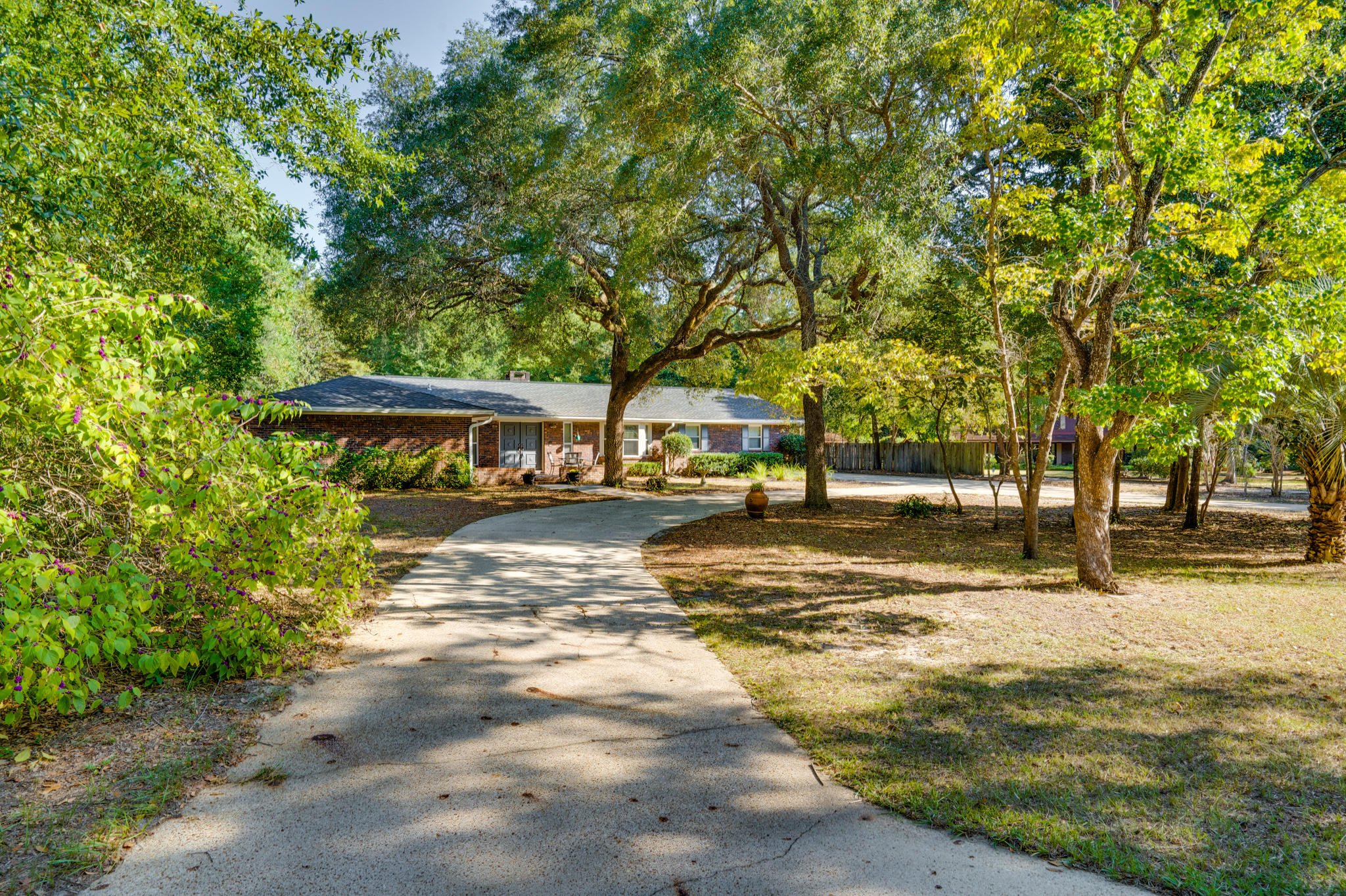 Don't miss your chance to own this wonderful home in the highly sought after Rocky Bayou Estates! This ranch style home with a pool is situated on over a half acre lot, located in a quiet cul-de-sac nestled among mature oak trees. This one owner home has recently been renovated offering a new roof, new AC, new garage and new paint throughout the entire house (all in 2019). The kitchen features granite counter tops, new stainless steel appliances, with a breakfast bar and a breakfast nook for casual eating. There are two spacious guest bedrooms and a guest bathroom with with a shower/tub combo and the large master suite has a private entrance to the patio/pool area. All bedrooms have brand new carpet! The large living area has an inviting brick fireplace with