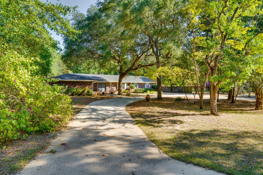Don't miss your chance to own this wonderful home in the highly sought after Rocky Bayou Estates! This ranch style home with a pool is situated on over a half acre lot, located in a quiet cul-de-sac nestled among mature oak trees. This one owner home has recently been renovated offering a new roof, new AC, new garage and new paint throughout the entire house (all in 2019). The kitchen features granite counter tops, new stainless steel appliances, with a breakfast bar and a breakfast nook for casual eating. There are two spacious guest bedrooms and a guest bathroom with with a shower/tub combo and the large master suite has a private entrance to the patio/pool area. All bedrooms have brand new carpet! The large living area has an inviting brick fireplace with