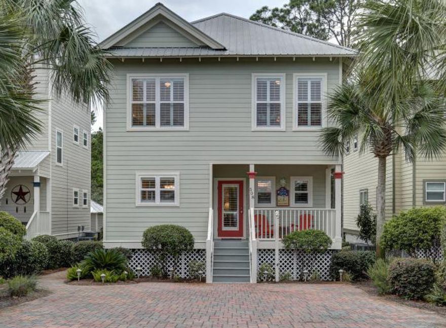 Incredibly charming, well-maintained, 2 story Florida beach cottage in the exclusive 30A community of Old Florida Village. Close to the beach, this quiet cul-de-sac community has 2 pools and lots of greenspace creating nice buffering between the streets and has no through traffic. You are greeted by a brick paver driveway and a large, cozy, covered front porch with a set of Adirondack chairs and a table. The 1st floor is very roomy and open. All the bedrooms are on the 2nd floor which allows much more living space. Beautiful oak floors grace the home along with crown molding throughout. Lots of sunny windows with plantation shutters give this cottage a warm and bright feel. The home is beautifully furnished and decorated and is being sold rental-ready. The large, open living room