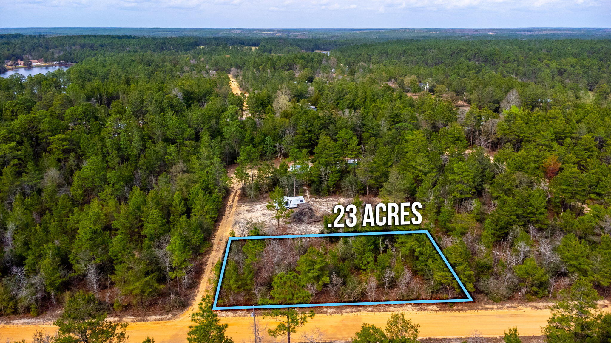 This lot is a very nice wooded level lot on the corner of a public road & private road in the Mossy Head area. It is approximately 125 ft wide & 80 ft deep (estimates only). Zoned rural low density & located in flood zone X according to the County GIS map. Making it a great location to build a home or setup a manufactured home. Power is available along the street & public water is available in the area. Tap fee has not been paid and will need to be paid through Mossy Head Water Works. There is no public sewer available. Therefore, a septic system will need to be installed.