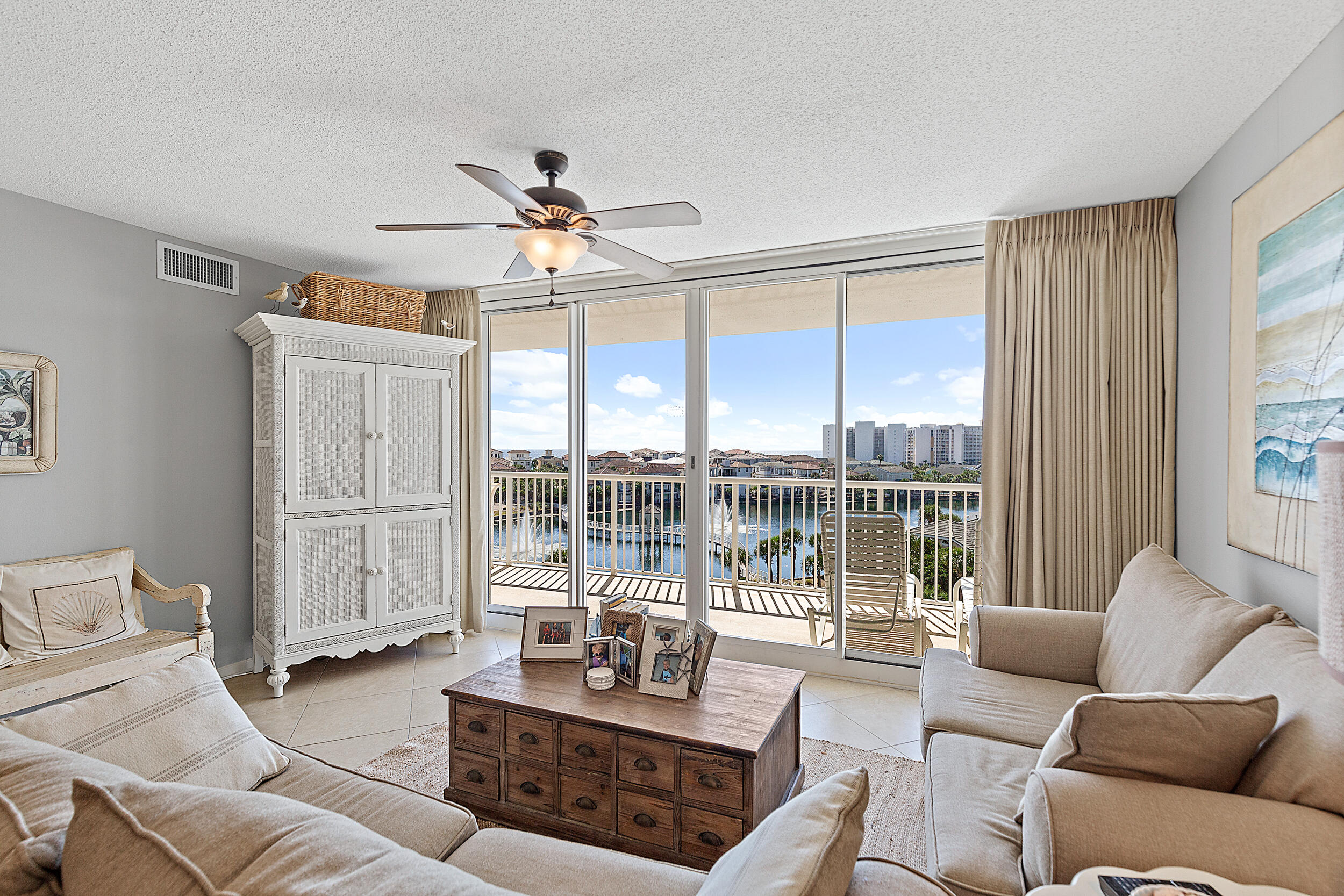 This 3 bed/ 2 ba condo has been used as a SECOND HOME and is in PRISTINE CONDITION with INCREDIBLE VIEWS of the Gulf of Mexico and lake. As you enter the condo you are welcomed with an open layout of kitchen/dining and living room. The oversized balcony is accessible from the living room and master bedroom and allows plenty of outdoor seating to enjoy the sunsets or weekly seasonal fireworks shows. The kitchen has a nice size breakfast bar,  white cabinets, stainless steel appliances, granite countertops with matching backsplash. This condo is sold furnished with some exceptions. Other features: stackable washer/dryer, owner's closet. PROJECTED GRI OVER $60K and VA APPROVED. Great investment property, second home or permanent residence. The Terrace is located in one of the most