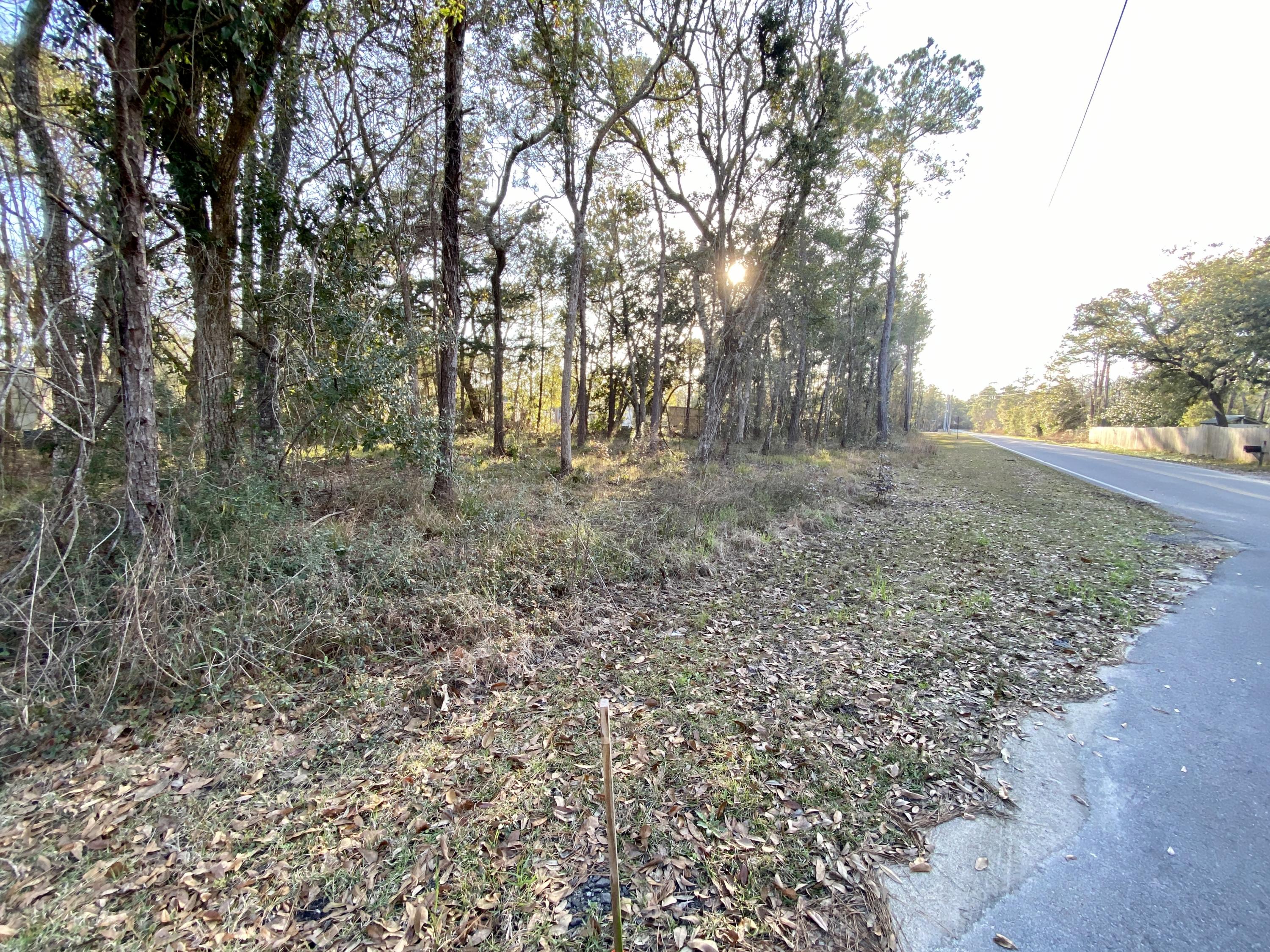 Nice corner lot in Magnolia Baye. No HOA. Only a Short drive to dining, shopping, and some of the world's most beautiful beaches! New homes being built in the area. Public Boat access to the Choctawhatchee Bay and Black Creek just minutes away. Survey available upon request. Don't let this one get away.