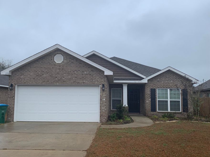 This three-bedroom/two-bath split floor plan offers an open flow concept between the spacious living room and kitchen PLUS a flex space that makes for a fabulous dining room, home office, homeschool room, music room, or playroom. Enjoy the beauty and detail of the living room and primary bedroom's tall trey ceilings and crown molding. Spend some time in the kitchen admiring the pantry, ample cabinet space, stainless steel appliances. Another great space is the primary bedroom, with a walk-in closet and ensuite bathroom. The ensuite offers a soaker tub, stand-in shower, and dual vanities. The indoor laundry room is adjacent to the kitchen and has both cabinets and open-face built-in shelving for additional storage. A fully fenced yard and a two-car garage round out this great property. Redstone Commons amenities include a fenced-in dog park, a community pavilion, and a community pool. Consider this as your next home!