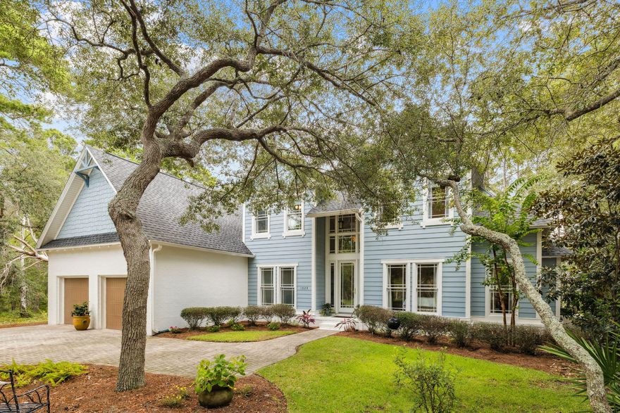 Welcome to 1628 Lost Cove Lane, a beautifully updated 4 bedroom, 3 bath home with an additional office or flex room, perfectly positioned on the 10th Green of the Shark's Tooth Golf Course in the gated community of Wild Heron.Inside, you'll find 20 foot ceilings, oak wood flooring, a gas fireplace, and custom windows that frame clear golf course views and showcase thoughtfully designed architectural details throughout. The kitchen features stainless steel appliances, granite countertops, a breakfast bar, and a new range and oven. Two bedrooms are located on the main level, including the spacious owner's suite with tranquil course views.Recent upgrades include new ceiling fans throughout, freshly painted white cabinetry in the kitchen, baths, and laundry room, new toilets in each bathroom, a one-year-old water heater, two HVAC units just two years old, a four-year-old roof, and new exterior paint.

The screened patio opens to a landscaped backyard complete with new sod, a built-in grill cabinet, and a cozy fire pit, perfect for relaxing or entertaining. Wild Heron offers exclusive access to Lake Powell, walking trails, a fitness center, resort-style pool, and if you're a member of the Watersound Club - the private Shark's Tooth Golf Club.