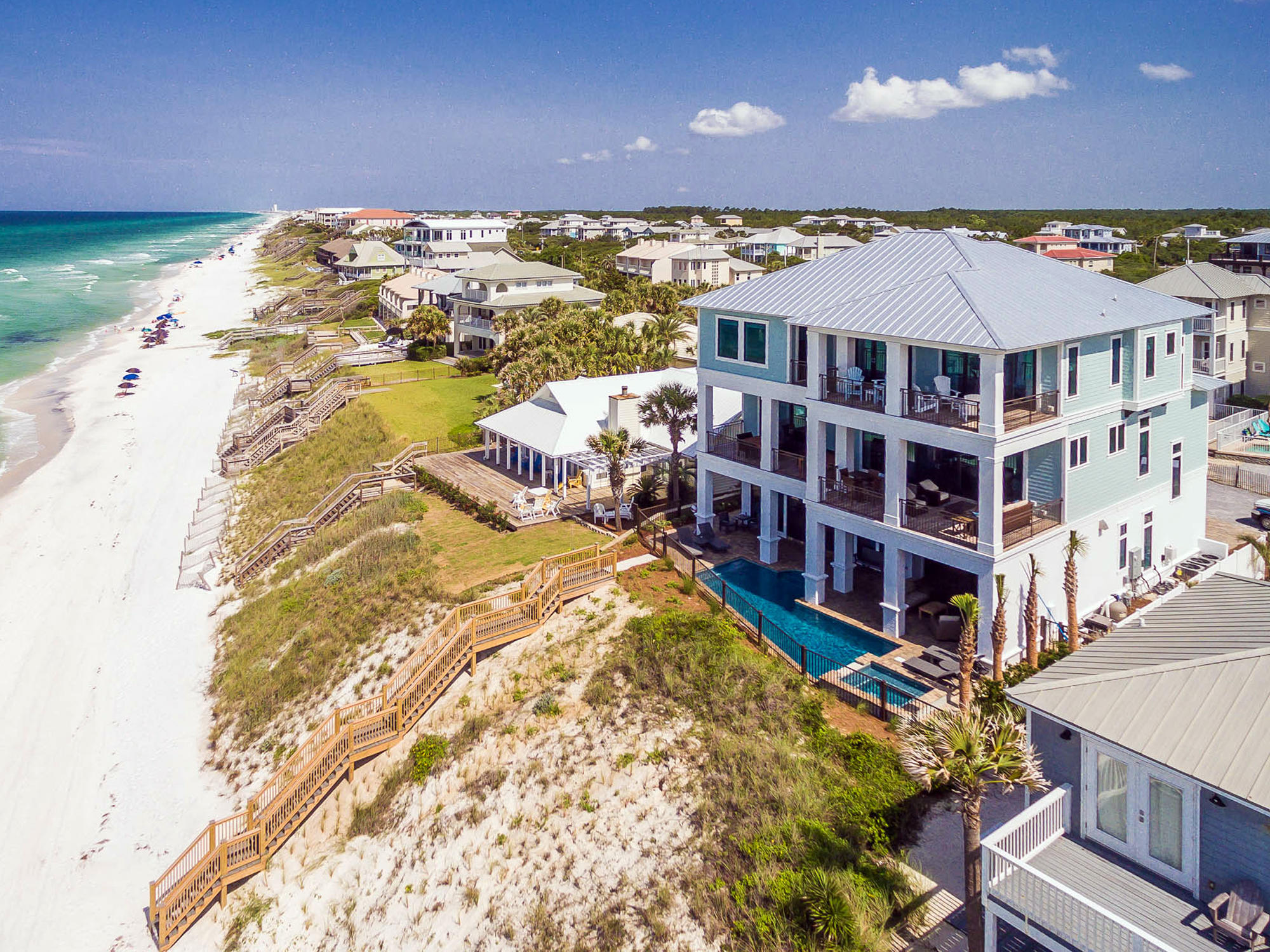 Painted Sky is truly a one of a kind Gulf front residence with an endless list of brilliant features and open, functional living space unlike any other home available on the 30A market. Newly built in 2016, the home is fresh, bright, and put together in a stunningly grand fashion. From the oversized Gulf front pool and hot tub, to one of the most expansive living room and kitchen areas of any home along the 30A corridor, this gem takes Gulf front living to a new bar. Some of the many home highlights include a private beach walkover, 3 living rooms, pecky cypress ceilings, oversized porches with sunset views, two master bedrooms with Gulf views, elevator, and fully decorated with coastal decor. This home is an absolute must see for any serious buyer looking at Gulf front property on 30A.