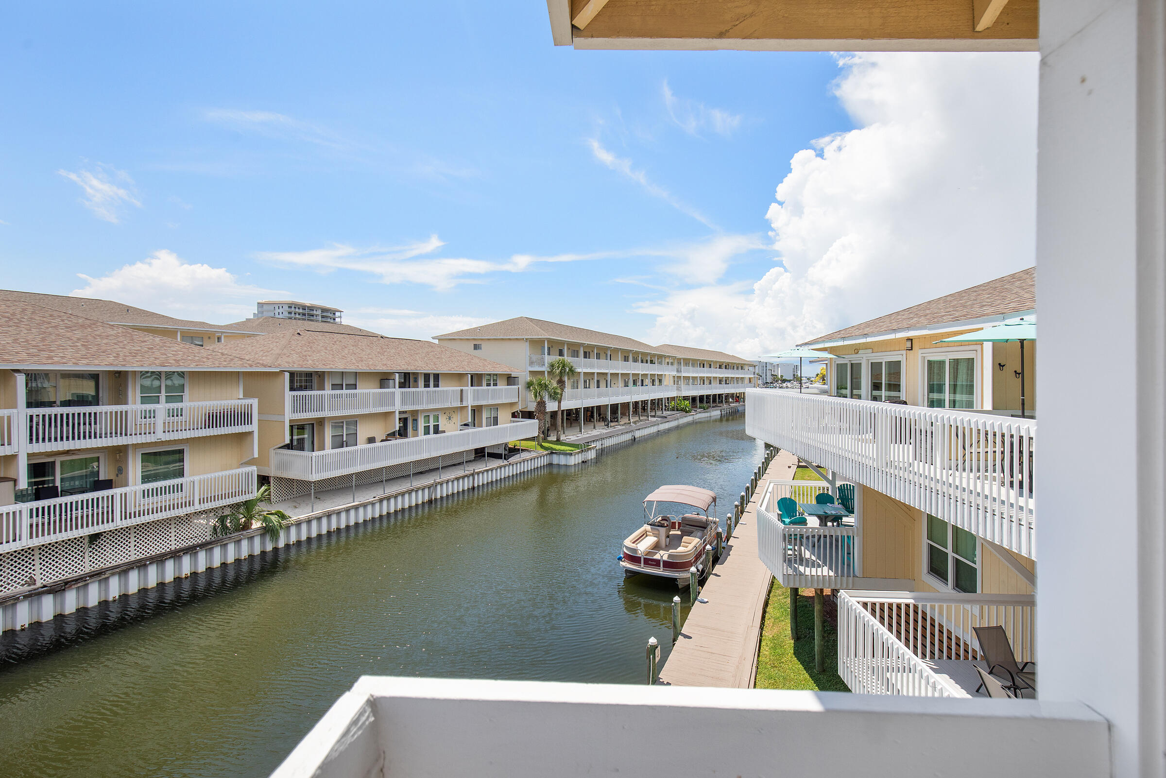 This beautifully updated condo is ready for your next getaway or rental investment. Two new bunk beds increase the sleeping capacity from 4 to 6, perfect for family and guests. Enjoy the evening sunsets from the deck while watching the boats cruise the canal. Recent updates include new laminate flooring & fresh paint, smart TVs in living and bedroom, memory foam mattress in bedroom, and washer/dryer. Located within Sandpiper Cove (SPC) a gated, low density resort community in the heart of Destin, you'll have access to 1,100 feet of private beachfront with seasonal beach service. Amenities include 5 pools & 6 tennis courts, 9-hole par 3 golf course, Canal docking & marina slip leasing, pickle ball & grilling areas, on-site dining. This is a great opportunity to own a canal front condo!