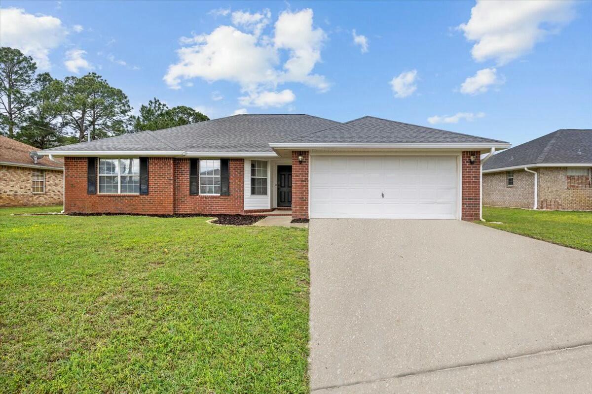 Welcome to this AMAZING home to entertain family and friends! The home features 3 bed/2 bath with plenty of closets for convenient storage throughout. The stunning kitchen has espresso cabinets that are taller than standard to the ceiling. A deep rectangular farm sink and finished counters are a thick granite. The bathrooms have the same finishes to tie the home together. The flooring is a laminate wood look for durability of high traffic and eliminating odors. The home gets plenty of natural lighting, but you will appreciate the fact that they are tinted windows to block harmful UV rays and assist in the power bill. Plenty of room for a pool also! Carpets replaced in 2021. The home is on sewer and not septic. The back yard features an oversized shed with power and overhang, fire pit area redone in 2023, tree in from yard and flower beds done in 2024, fully fenced, new roof in 2020, newer HVAC, and a 50gal water heater are just a few teasers to talk about! Home also features soffit lighting along the front of the home for accent lighting and security.