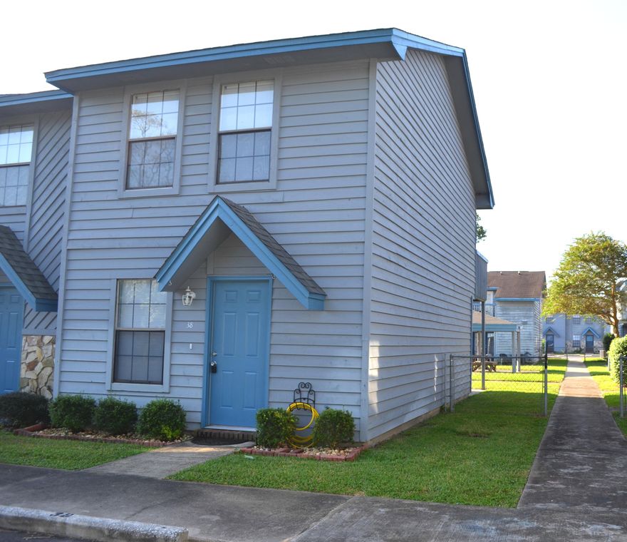 End unit located in Brownsville Station. Well kept complex with community pool. Tile downstairs with a separate laundry room. Walk in closet in master bedroom and a balcony. Upstairs bathroom features an updated shower and tub. Open back patio short distance to pool.