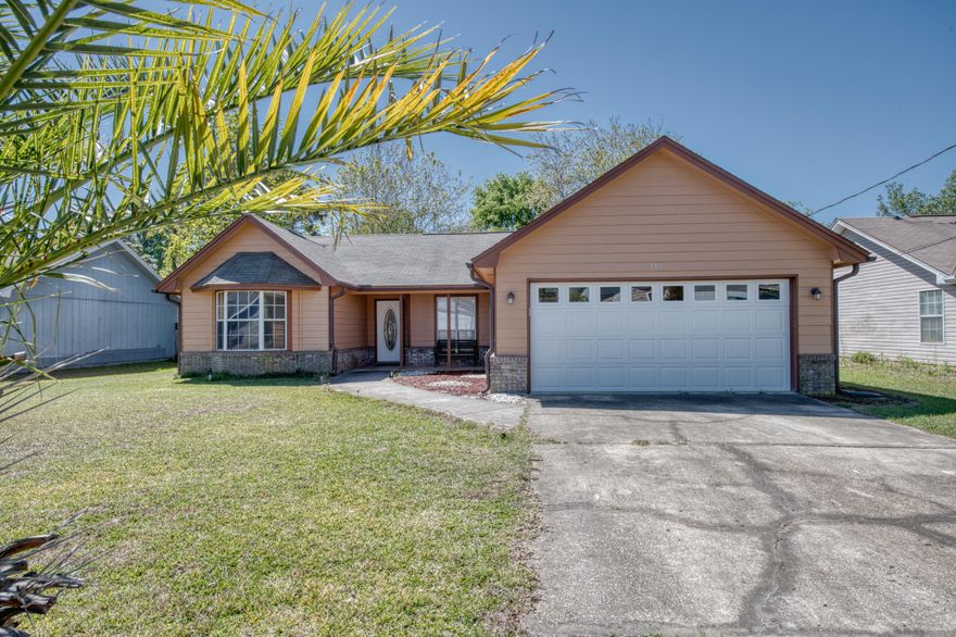 This must-see Mary Esther home has been beautifully updated and is within 5 miles of Hurlburt Field! Walk in to see an open main living area with vaulted ceilings, great for entertaining guests. Kitchen has been updated with new cabinets, stainless-steel appliances, and granite countertops in 2015. Split bedrooms, for added privacy into the master suite; which has a tiled shower and spacious walk in closet. Porcelain tile throughout the main living area and bathrooms and carpet in the bedrooms. Replaced water heater, HVAC, washer/dryer, irrigation pump and rain gutters in 2015. Spacious, fenced in back yard with screened in back porch. This home is located on the last street of a quiet neighborhood, which avoids unnecessary traffic. Come check out this move in ready home today!