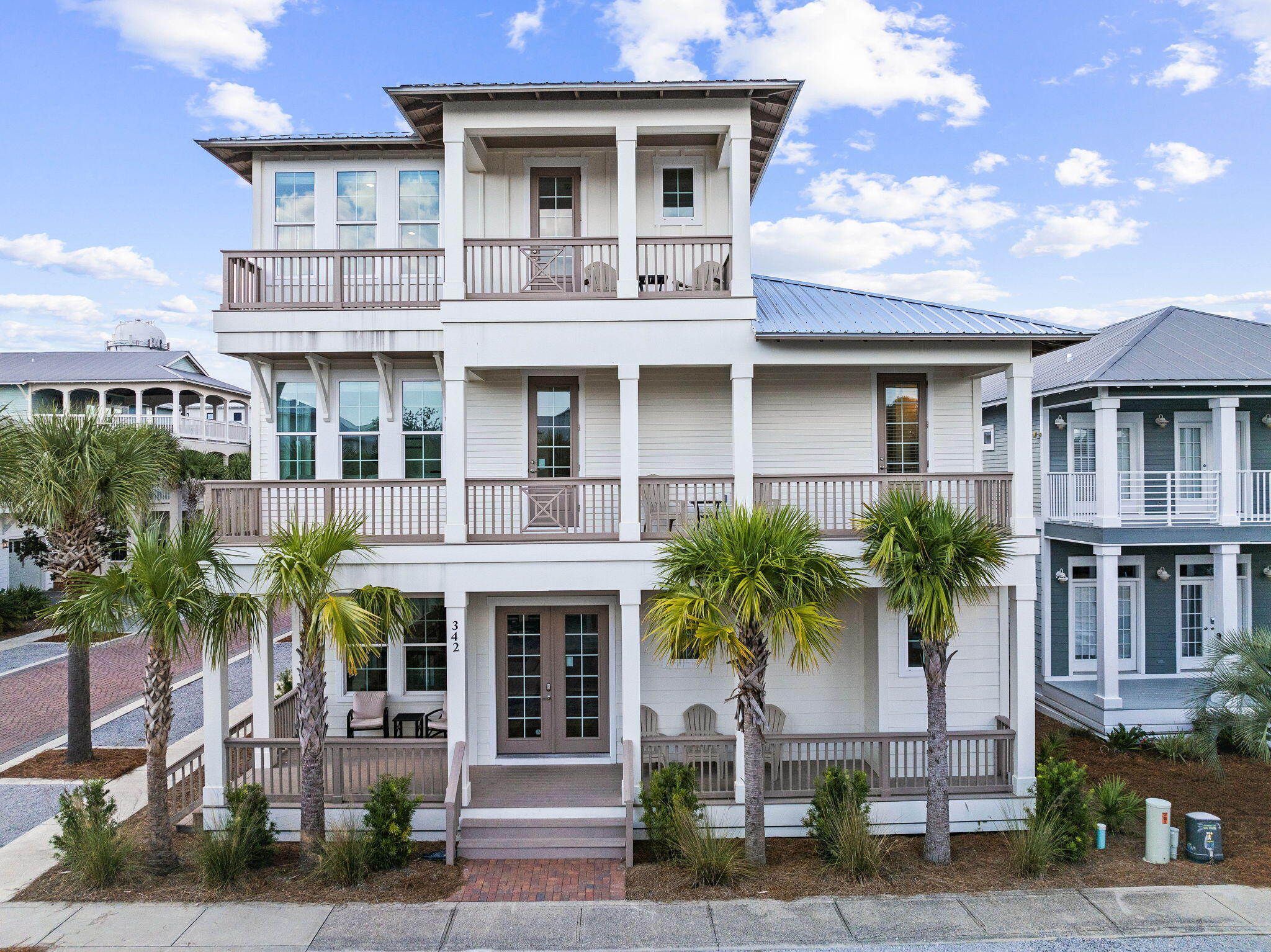 Introducing an exceptional new construction home, masterfully designed by J. Michael Hunnicutt and built by Gary Bailey, located in the heart of Seacrest Beach, just minutes from Rosemary Beach and Alys Beach. This stunning property offers one of the largest floor plans in the community showcasing luxurious finishes and thoughtful attention to detail throughout. Upon entry, you're welcomed into an expansive, open-concept living area perfect for both daily living and entertaining. Vaulted ceilings with exposed wood beams, custom bar area, and an inviting fireplace anchor the space, while the kitchen boasts high end appliances, quartz countertops, and a generous island perfect for gathering with family and friends. Adjacent the dining and living areas, you'll find a spacious patio  perfect for alfresco dining and entertaining by the private pool.

The first of two primary suites is conveniently situated on the main level, featuring an en-suite bathroom with a soaking tub, dual vanities, and a large walk-in shower. The second-floor primary suite is equally impressive, offering private access to a generous balcony equipped with an outdoor TV, perfect for entertaining or relaxing outdoors.

The second floor features a massive guest bedroom fitted with three bunk beds, creating the perfect retreat for families or groups. This thoughtful design makes the home an incredible investment opportunity for those interested in short-term rentals, as it allows for maximum guest accommodation and comfort. Additionally, a cozy den on this floor offers extra living space, ensuring ample comfort for all guests.

The third level is also designed for entertainment, featuring a spacious bonus room ideal for a media lounge or game room with a custom built in bar. With 628 square feet of porches spanning three levels, this home is made for outdoor livingwhether relaxing by the private pool or enjoying stunning views of Seacrest Beach.

Additional features include a generous garage with ample storage, and an additional flexible bonus room above the garage that can be used as an office, gym, or additional guest sleeping space. Located in the vibrant Seacrest Beach community, this home offers access to a 12,000-square-foot lagoon-style pool, 1.3 miles of trails, and convenient tram service to the white sand beaches of 30A.