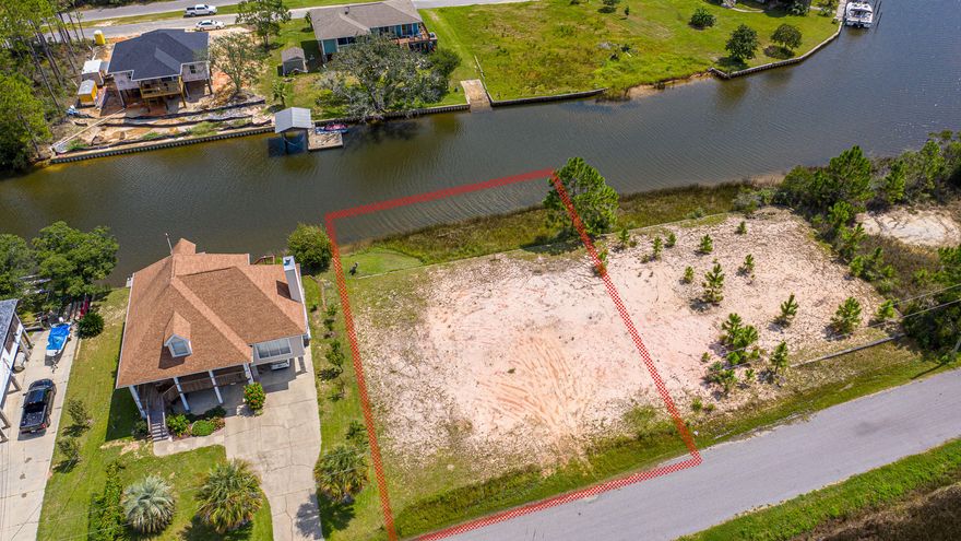A RARE FIND!  Here is the perfect lot to build the home you've always wanted! Discover this slice of paradise where you can relax to beautiful, endless views of the bay, go kayaking from the canal at your backyard, build your own dock for boating, catch fresh fish and enjoy this dream setting. Situated right on the canal with immediate access to the Bay and a seawall already installed. The property is well maintained and has had fill dirt brought in to increase elevation to 9 ft above sea level. Enjoy this quiet neighborhood of property owners who are invested in pride of ownership in a wonderful community. Located near I-10, military bases, gorgeous white sand beaches and all of the beauty the Emerald Coast of Florida has to offer.