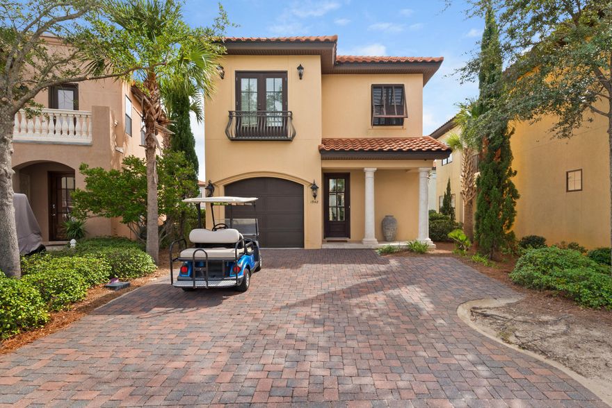 View Virtual Tour! Overlooking a canal-like lake with fountain, this upscale home is sold furnished and includes a golf cart with its own designated parking pad as an eco-friendly way to get around the super-sized resort. A double-wide driveway and single garage take care of parking for you and your guests. Ocean-cool decor creates restful vibes in this stunning designer residence which brings together a fusion of textures and harmonious accents. Spread over two floors, you'll notice this villa has generous living space. The open-plan living and dining areas invite you to relax and catch up on the day's adventures with family and friends. Modern glass tiles are used to good effect on the kitchen backsplash and again on the front of the breakfast bar. 2019 Gross Rental Income $43,806.16 Soft off-white cabinets are complemented by dark granite countertops which provide acres of space for preparing meals and snacks. Enjoy family dinners overlooking the canal or perhaps dine al fresco overlooking the lake. Tile floors give way to wood upstairs with fresh white tile in the bathrooms along with accent tiles featuring eye-catching metallic streaks. Four bedrooms include a first-floor bedroom, second floor master suite with upstairs balcony, and two beautiful guest bedrooms. You are enviably located a short stroll from the Village at Baytowne Wharf with its boutique shopping, dining and bayside marina. This home is all about the lifestyle - community pools, white sandy beach, Grand Boulevard shopping, tennis, golf, fishing, boating and watersports on Choctawhatchee Bay. When not in use by owners, it could generate passive income as a well-located vacation rental.