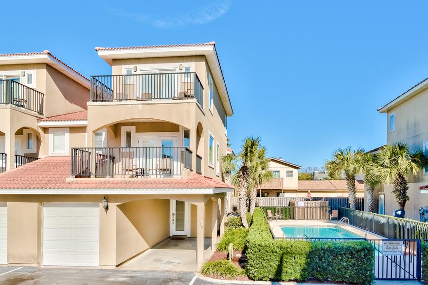 Located on the west end of PCB this beautifully maintained townhouse is in a low density community. Property is located a short 5 minute walk from the beach and steps from the pool. This 3 bedroom 3.5 bath has balconies on each level and gulf views.There is an additional room that can be transformed to a bunk room for added sleeping accommodations. Home will live wonderfully as a vacation rental and or full time residence. The one car garage and carport provides for plenty of room for beach gear and golf cart storage.