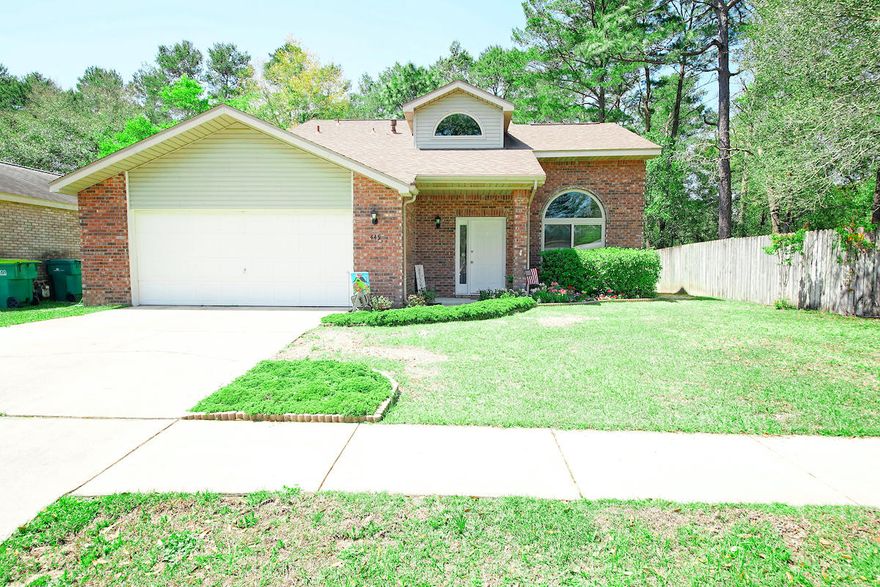 Welcome home to this beautiful three bedroom, two & a half bath brick-front home conveniently located in the heart of Niceville.  Move-in ready, with an open concept and the master bedroom located on the first floor!  The tiled kitchen has stainless appliances (including a gas stove), rich wood cabinets topped with durable, stain-resistant, Silestone countertops and a bright breakfast nook that opens to the formal dining room.  The living room has high ceilings and an arched front window; you'll enjoy the warmth and convenience of the gas fireplace and the luxury of beautiful wood floors that flow from the living room into the dining area.  There is a laundry room and a half bath downstairs for convenience.  The master suite offers a huge walk-in closet, separate shower and a relaxing tub