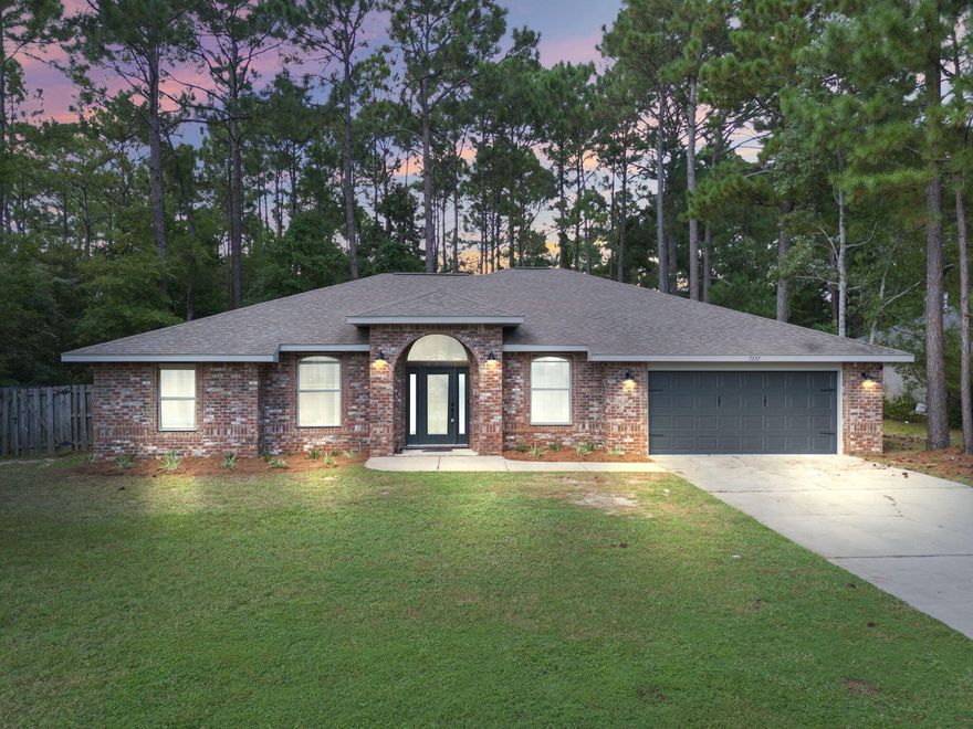 This beautifully renovated four-bedroom, three-bath home in Holley By The Sea has been meticulously designed. The property features elegant LVP flooring throughout, offering a carpet-free environment and a neutral paint palette. The main living area is an open-concept space, complete with a cozy fireplace and French doors that open to the rear patio. The kitchen has been tastefully updated with stainless steel appliances, granite countertops, new fixtures, faucets, lighting, an island area, and modernized cabinetry. In addition to the kitchen, there's a separate dining area, a breakfast nook or flex space, and a generous breakfast counter. The spacious primary bedroom includes a private ensuite with a large double vanity, a garden tub with an attractive backsplash, and a beautifully tiled separate shower. All bedrooms are well-sized with ample closet space. This home also offers plenty of storage, a laundry area with a work sink, and a well-finished garage. Relax in your hot tub on the private patio. As part of the Holley By The Sea community, you'll enjoy a wealth of amenities, including three pools, a weight and workout area, a game room, a sauna and steam room, tennis courts, pickleball, walking trails, picnic areas, a private sound-side beach, a boat ramp, pier, and more!