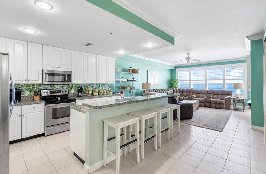 This stunning 3 bed/3 bath unit at the exclusive En Soleil condominium boasts a sprawling balcony that offers breathtaking views of all of Panama City Beach, complete with an outdoor kitchen space. This unit is located in the East tower and features a floor plan ideal for entertaining. The master suite has slider doors that open up to the LARGE balcony, making sunsets absolutely magical! Key upgrades include the HVAC system and water heater. Residents of the En Soleil building are provided luxurious resort-style amenities such as the beautiful sun deck and pool, fitness center, deeded underground parking, on-site security and management, and much more. Don't miss out on your opportunity to own this piece of paradise! Sold furnished.