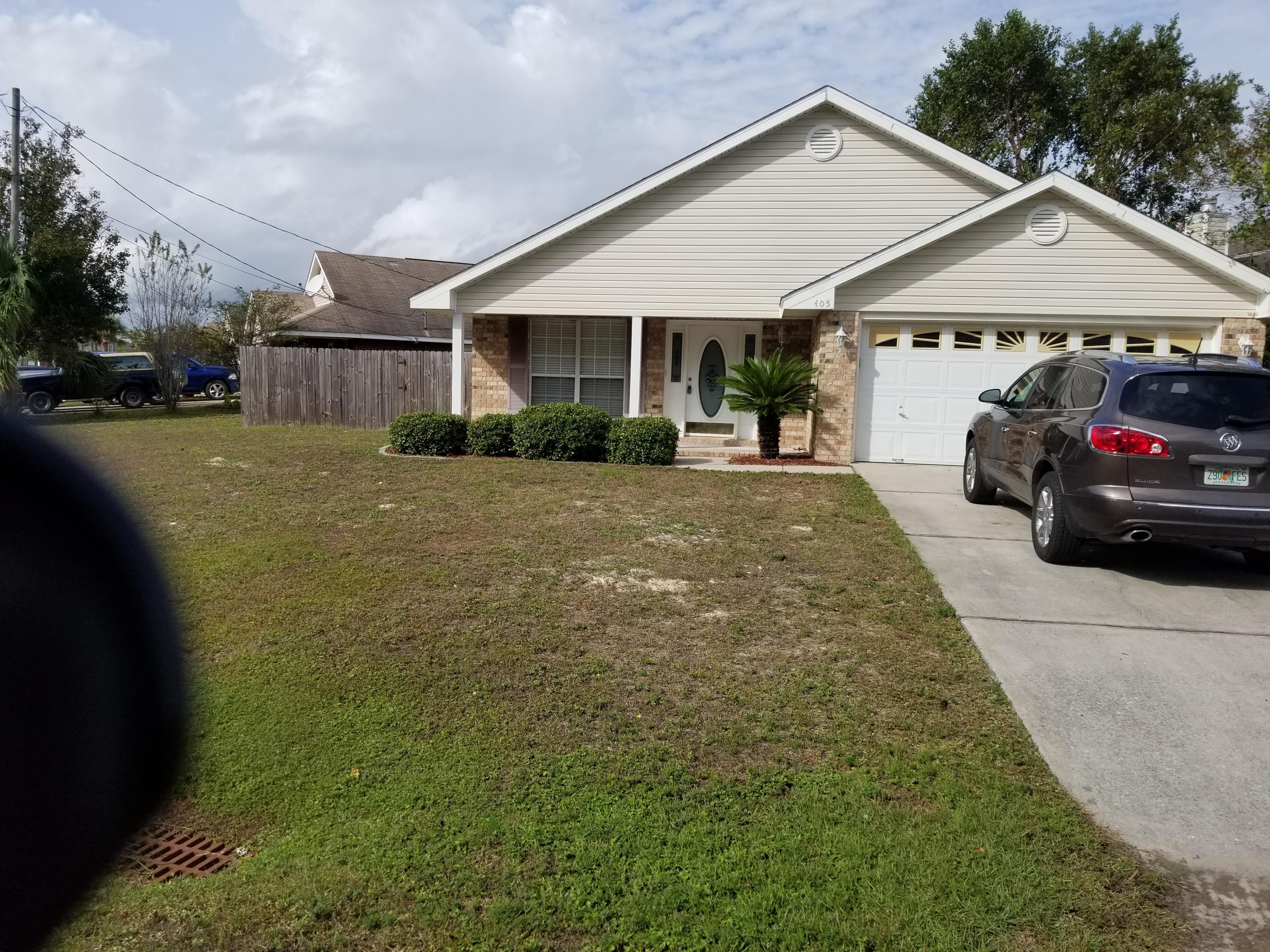 Fantastic opportunity to own a corner lot in the well known Waterford Estates. Approximately 5 miles to gate at Hurlburt Air Force Base, minutes from McDonalds and at a red light on 98 to make access easy any time of the day or night. winin minutes to the crystal clear emerald coast and white sandy beaches. This home is ready for a new owner, has a brand new roof to protect your belongings. Covered front patio, fenced back yard, 2 car garage and many other great features inside. Carpet and interior paint approximately 3 years old. Spacious and open floor plan, several plant ledges through out for displaying your collectibles, plenty of storage. Split floor plan for loads of privacy, Indoor laundry, sliding doors to privacy fenced back yard. Don't miss out on this fabulous fin