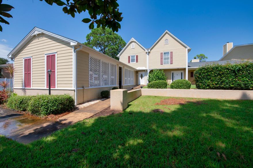 This is waterfront living at its finest. Feel truly connected to the water with amazing views of Garnier's Bayou and exquisite sunsets from your deck and master bedroom balcony. No more paying for boat storage! The deeded dock comes with a boat lift which can accommodate up to 5000 lbs. Natural stone flooring on the main level, stone fireplace, hardwood flooring in master bedroom, large upgraded baseboards and crown molding are just some of the more  notable features. Feel secure with your double rubber sealed 12 point locking German made doors leading to the deck.Low maintenance hardie board siding, a 2016 dimensional roof with lots of usable life and a $673 transferrable flood insurance policy will ensure worry-free living on Garnier's Bayou.