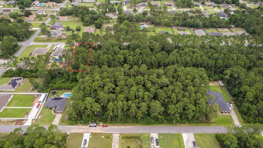 Come build your dream home on this large .45 acre lot in Navarre. No HOA. No improvements have been made. Raw uncleared land. Located just 3 miles to beautiful Navarre Beach and 13 miles to Hurlburt Field. 1 mile to Publix and other shopping and dining including the new entertainment complex to be built.