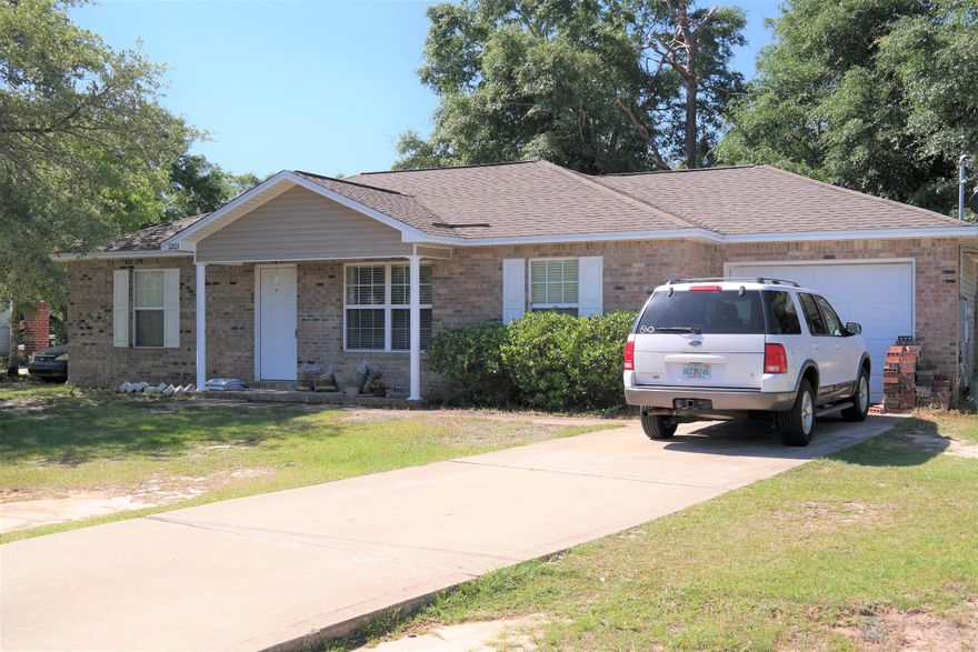 Great location for this 3 bedroom, 2 bath home, with attached 1-car garage, on over 1/3 acre within minutes to schools and down town Defuniak Springs. Low maintenance brick and vinyl home with generous partially fenced back yard. This one won't last long so schedule your showing today!