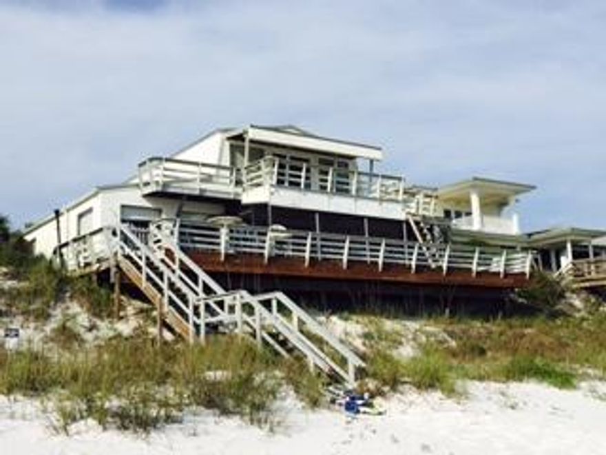 WELCOME HOME to the most secluded and beautiful Beach on Scenic Hwy. 30A. Pelican Circle is a small gated community that is bordered by the emerald waters and sugar white sands of the Gulf and also the rare Coastal Dune Camp Creek Lake. A more idealic setting is hard to find. This incredible homesite has panoramic Gulf views from all vantage points. Gulf front lots of this size (.409 acre) are very rare. Current home, built in 1979, has been a wonderful Beach retreat for friends and family with its spacious front wrap around deck that offers a relaxing oasis for all ages. Wonderful large family living/dining with Gulf views. Bike to Rosemary Beach, Alys and all the fun shops, restaurants, entertainment of Scenic Hwy. 30A. Start living your DREAM where every day is a weekend.