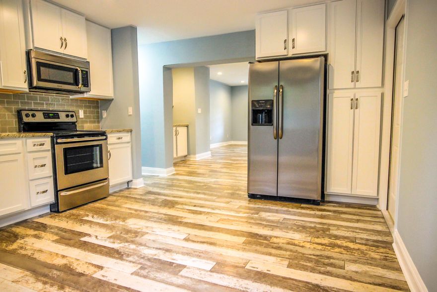 COMPLETELY RENOVATED RANCH 3 BEDROOM PLUS BONUS ROOM! MUST SEE. LOVE LOVE LOVE this flooring & amazing colors! New wiring, new Roof, newer HVAC, new, New Ducting, New fixtures, new bathrooms, new tile, new granite kitchen with shaker cabinets and stainless steel appliances, nearly new everything & your own custom wet bar! Split floor plan includes Master Suite that is large with walk in closet!!! Central Location in Fort Walton Beach quick drive to the beach and less than 10 minutes to both bases, just under 1700 sqft with a beautifully sized fenced in yard, lawn pump, sprinkler system and yard building! You will love the extended driveway and side yard to park a boat or RV. You can also add carport! Front & Back Patio! Will go fast. See Today!