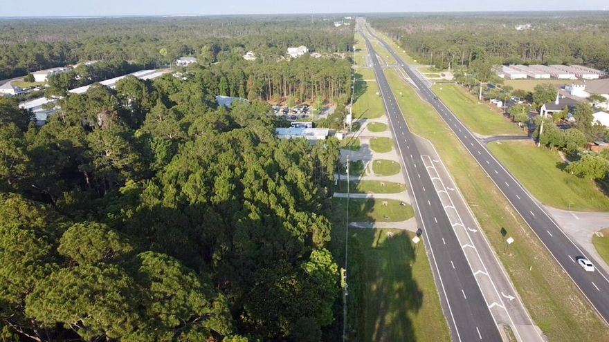 Vacant Commercial Land zoned Village mixed use (VMU). 2.37 acres. Prime 2.37-acre parcel of commercial land located in the highly sought-after area of Santa Rosa Beach, FL with 40,500 AADT traffic count. Situated in a prime location, this property offers exceptional potential for investors and developers alike. Curb cut already in place.Boasting a coveted zoning designation of Village Mixed Use, this parcel presents a unique opportunity for a variety of commercial ventures. Whether you're looking to establish retail outlets, restaurants, office spaces, or mixed-use developments, this versatile zoning allows for a wide range of possibilities to cater to the vibrant community of Santa Rosa Beach.This parcel of  2.37 acres is 1 of 2 parts in whole of an available 3.37 acres. Across from the New upcoming approved Porsche Dealership of Santa Rosa Beach. Lot is available in part or in whole.