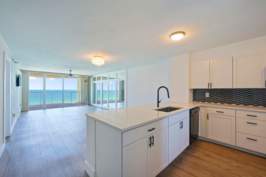 SPECTACULAR VIEWS ***10TH FLOOR GULF FRONT *** PRIVATE BEACH*** GATED COMMUNITY WITH 24-HOUR SECURITY*** EASY TO SHOW ANYTIME!WELCOME TO YOUR DREAM BEACHFRONT CONDO AT 9815 US HIGHWAY 98 W UNIT 1004 IN HIDDEN DUNES! THIS EXQUISITE 10TH-FLOOR GULF FRONT UNIT OFFERS BREATHTAKING VIEWS AND A LIFESTYLE OF LUXURY AND TRANQUILITY. RECENTLY RENOVATED THROUGHOUT, THIS CONDO IS A COASTAL HAVEN, BOASTING A SOOTHING AMBIANCE WITH COASTAL HUES AND GORGEOUS NEW LVP COASTAL WOOD-LIKE FLOORS. STEP INTO THE FULLY RENOVATED KITCHEN, COMPLETE WITH GLEAMING NEW QUARTZ COUNTERTOPS, DEEP SINK, WHITE SHAKER CABINETS, AND TOP-OF-THE-LINE APPLIANCES, INCLUDING A MICROWAVE, STOVE, DISHWASHER, REFRIGERATOR, WASHER, AND DRYER. ENJOY THE STUNNING GULF